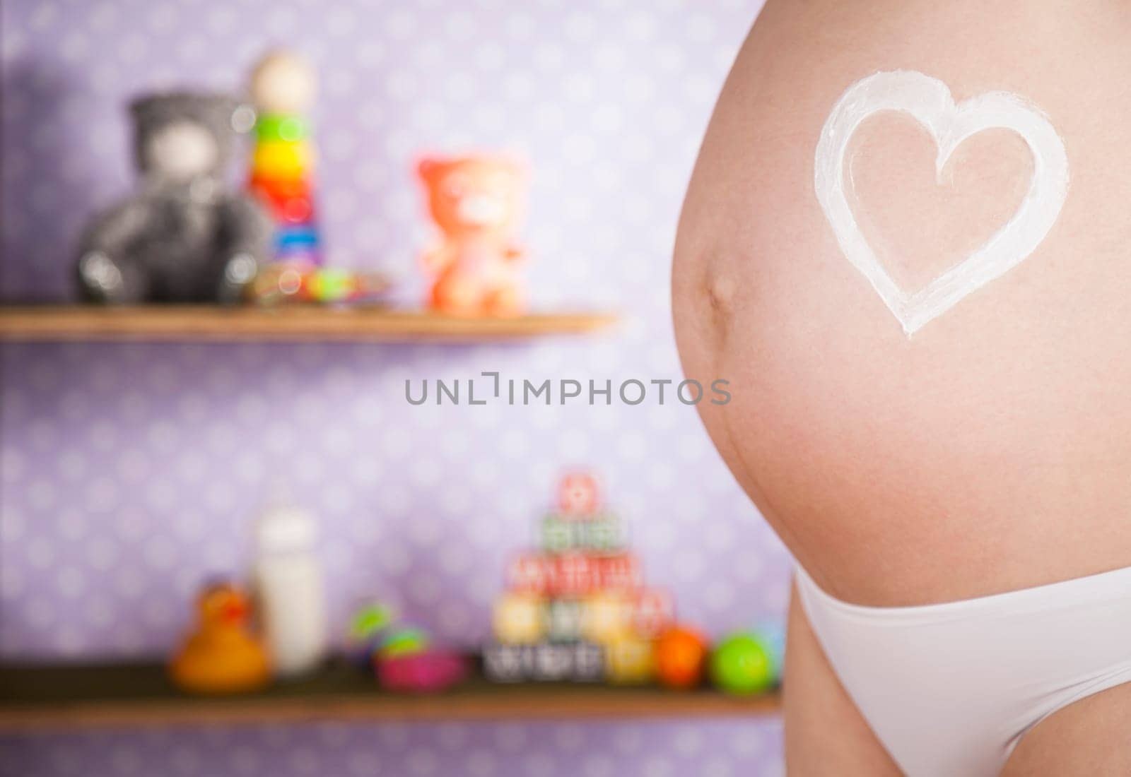 Pregnant woman loving her baby