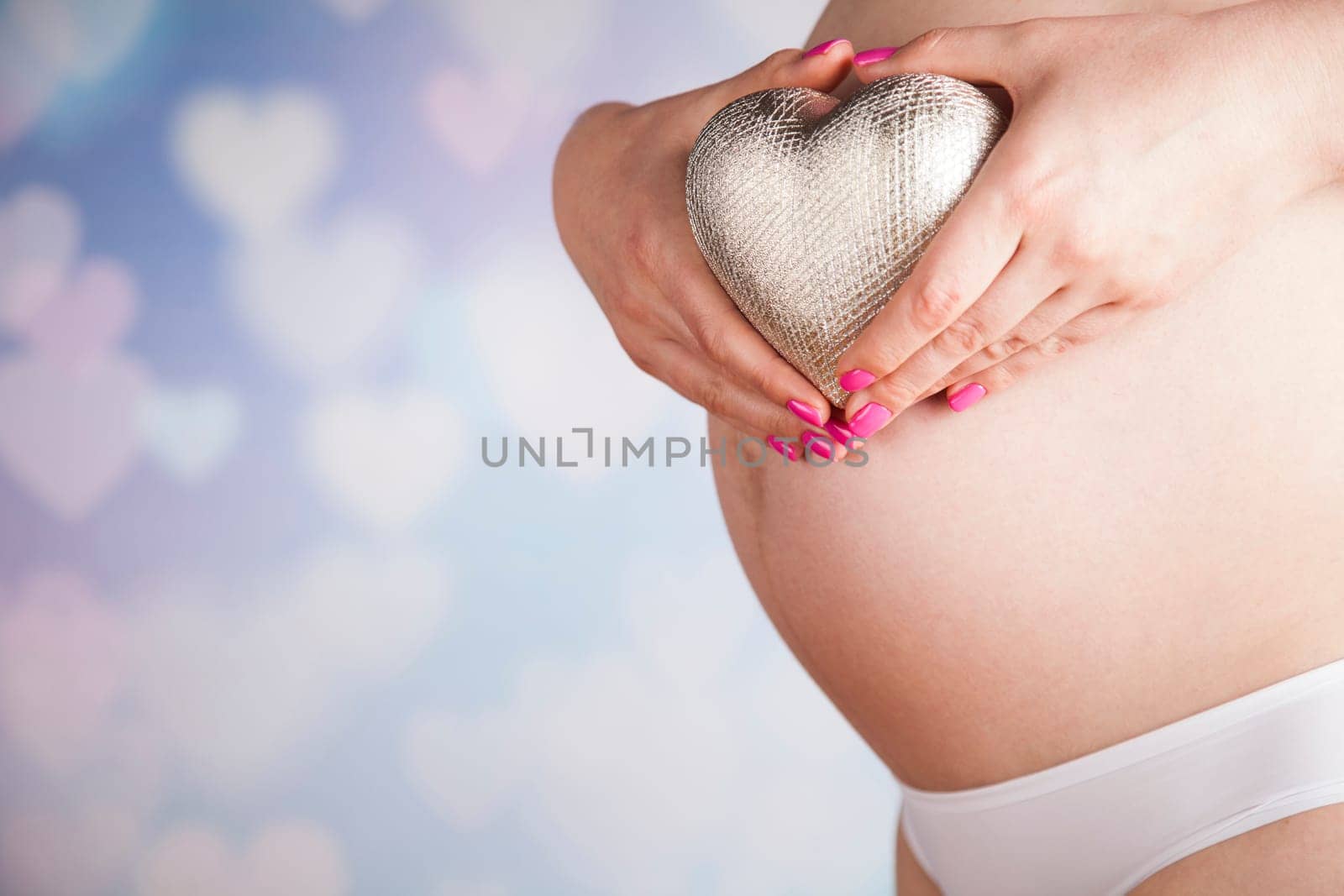 Pregnant woman loving her baby