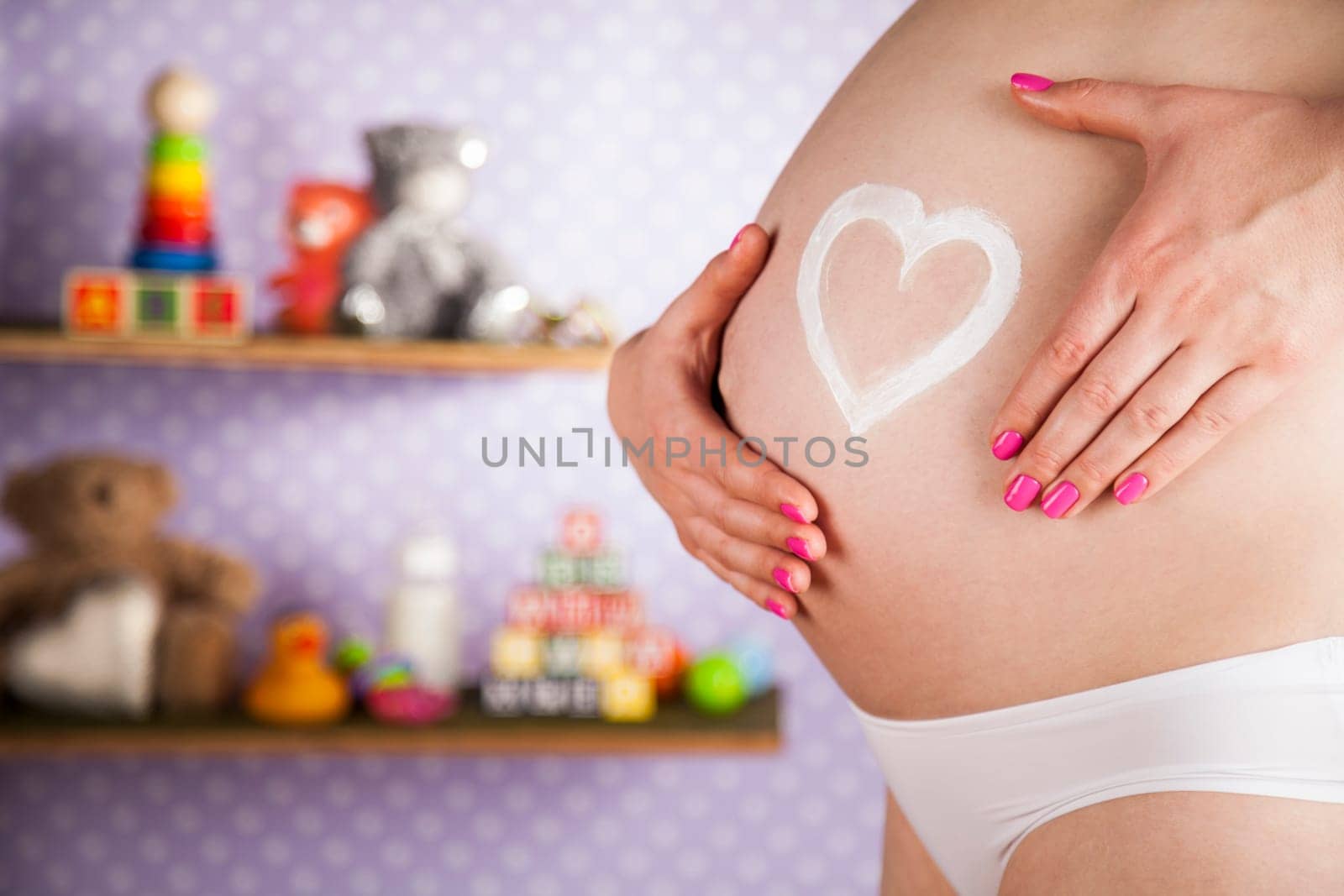 Pregnant woman loving her baby