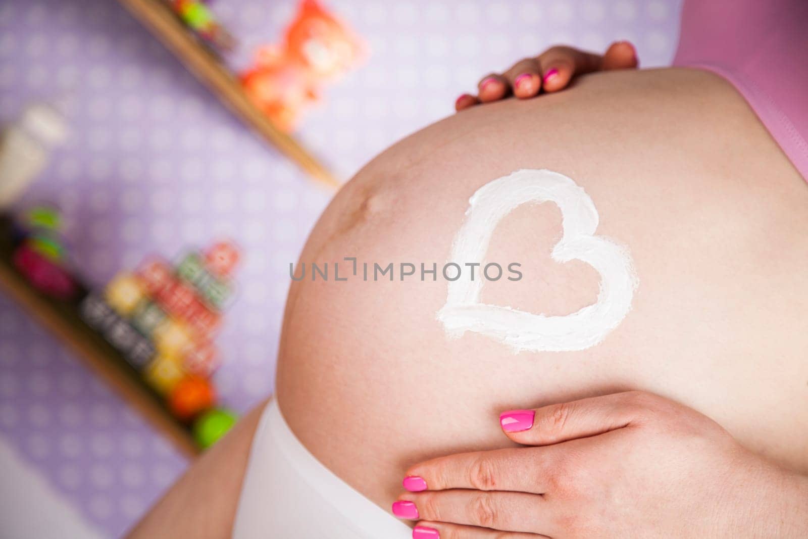 Pregnant woman loving her baby