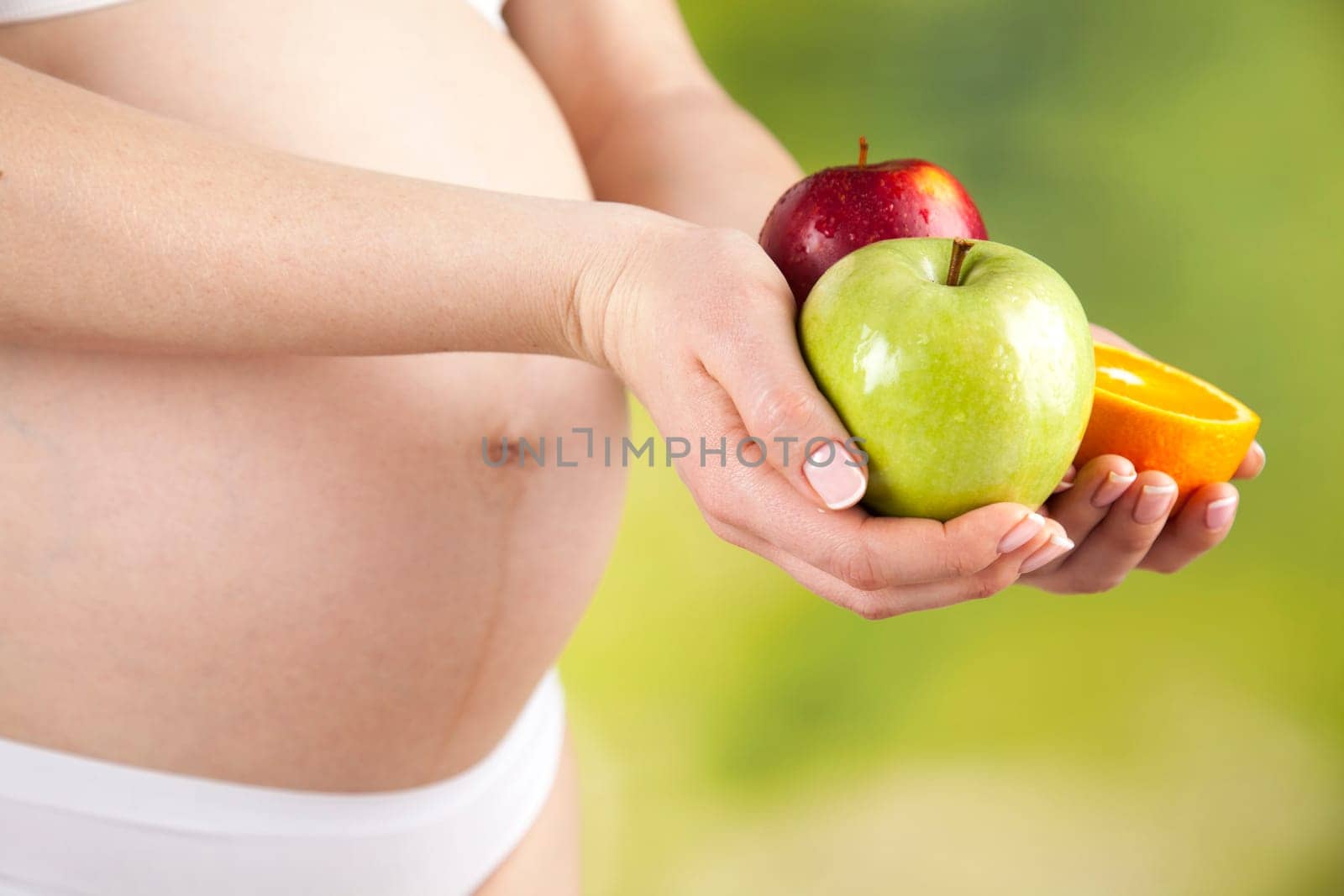 Pregnancy, healthy food and people concept