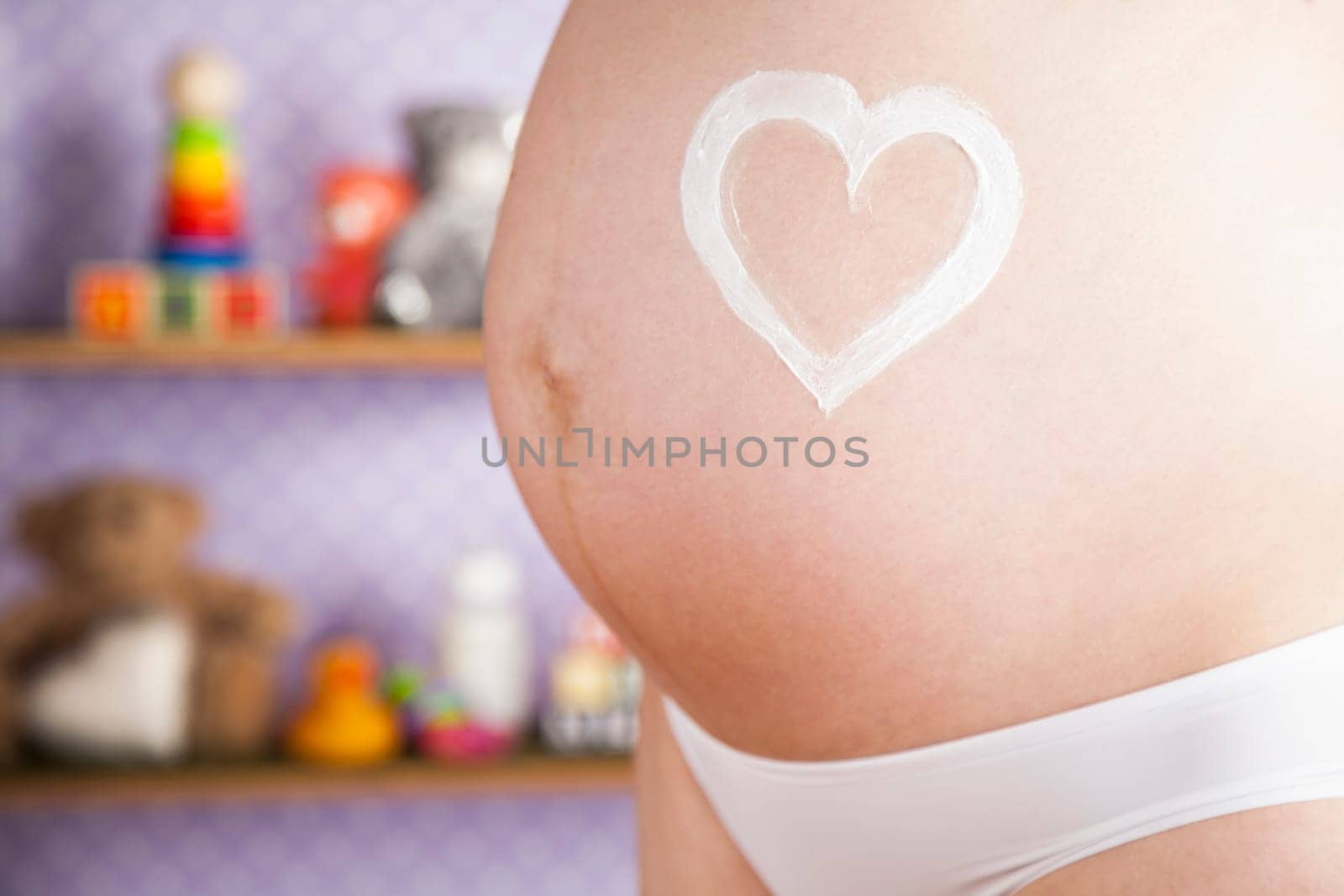 Pregnant woman loving her baby