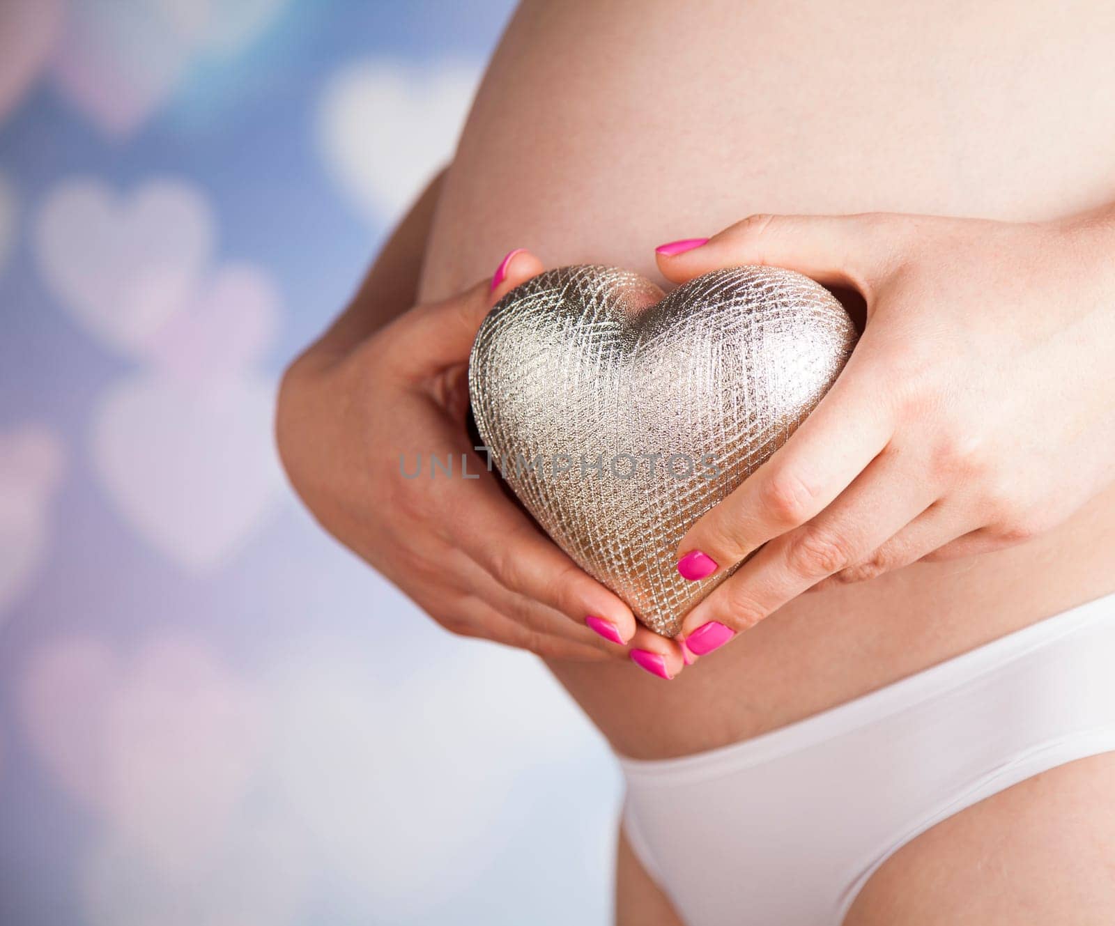 Pregnant woman loving her baby