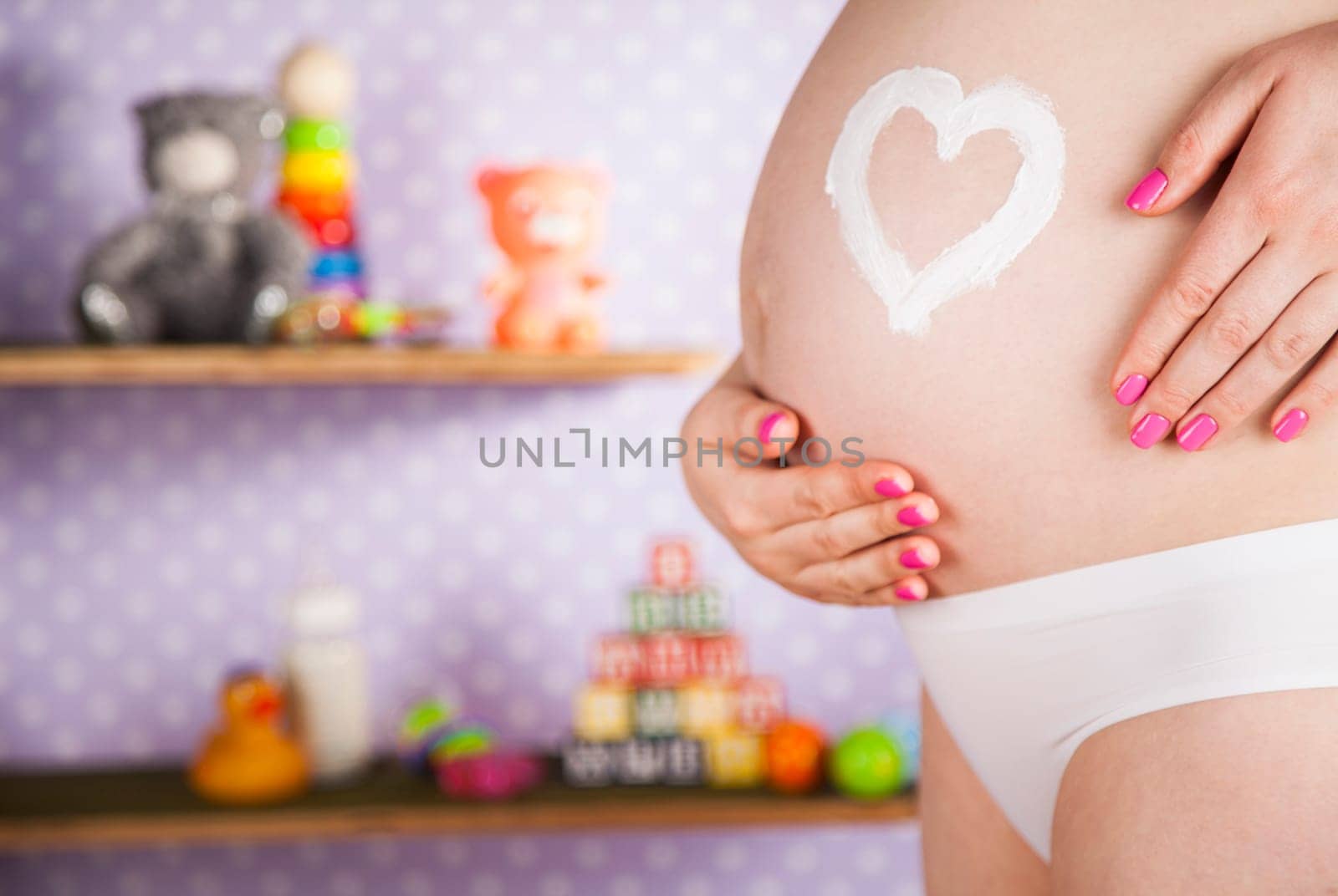 Pregnant woman loving her baby