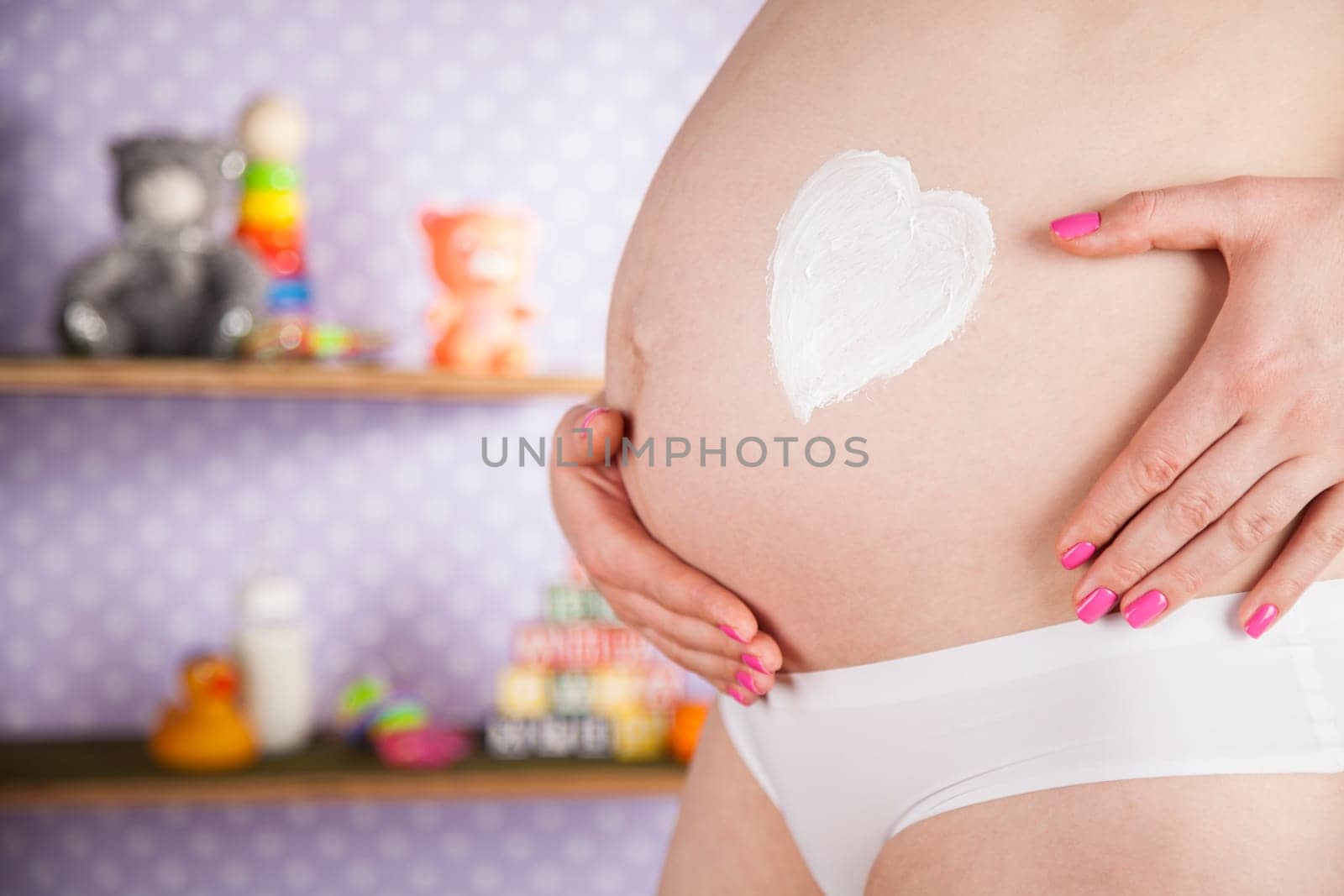 Pregnant woman loving her baby