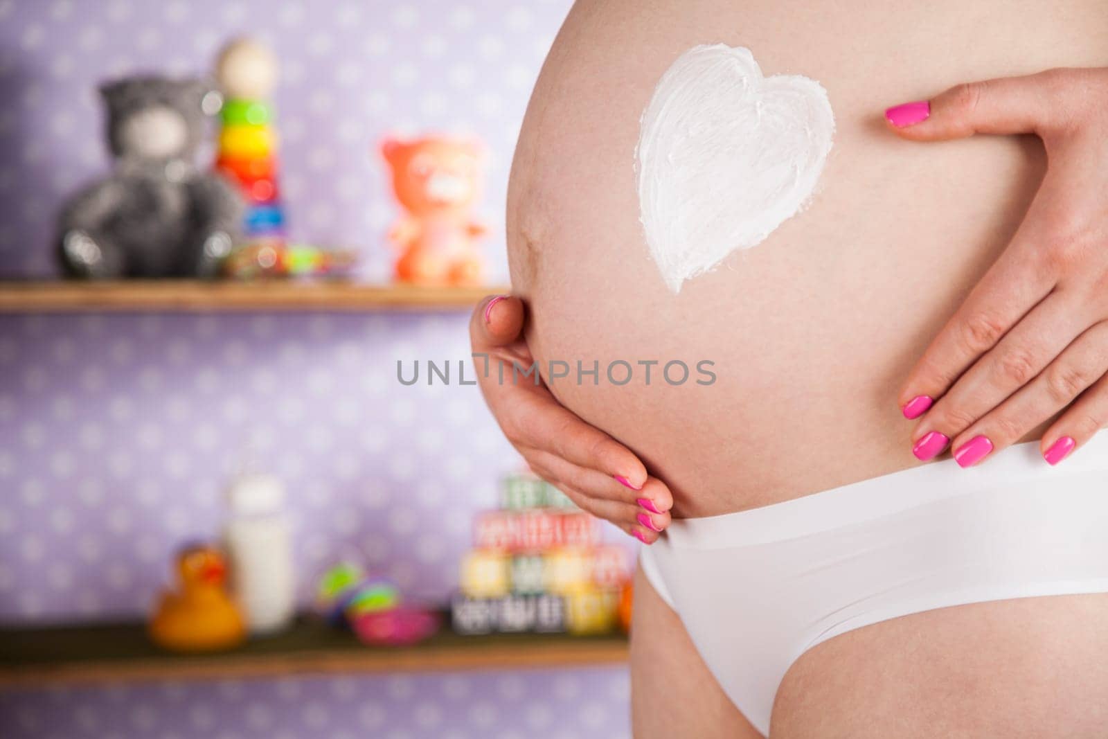 Pregnant woman loving her baby