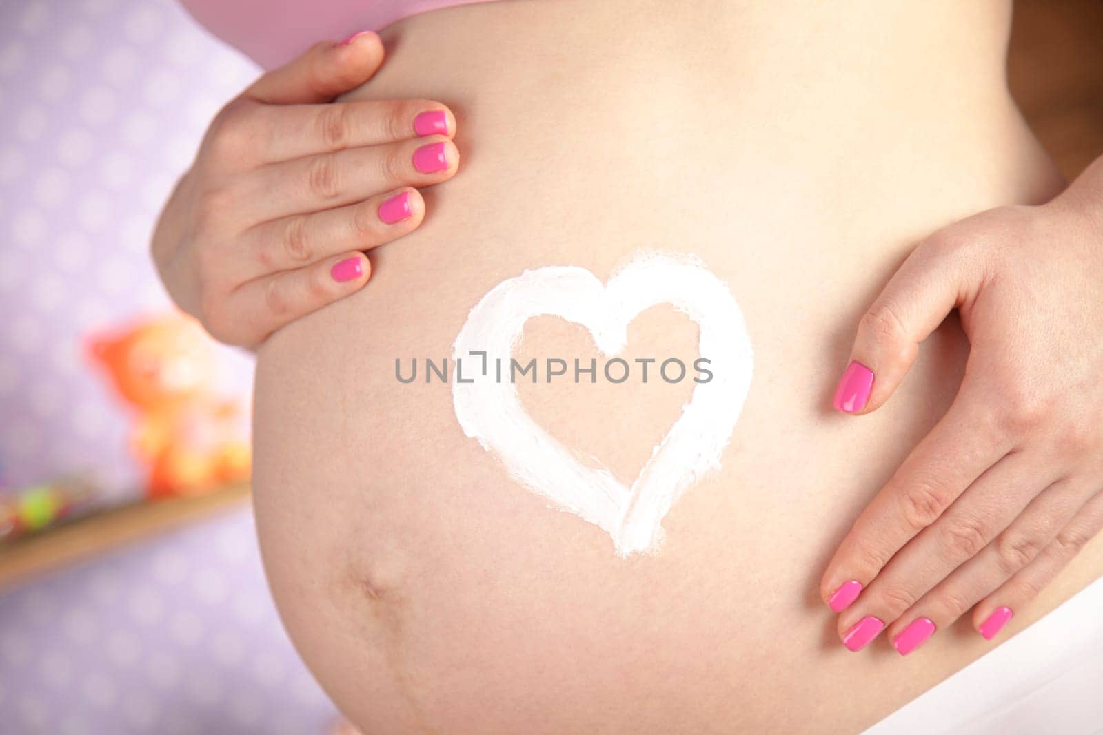 Pregnant woman loving her baby