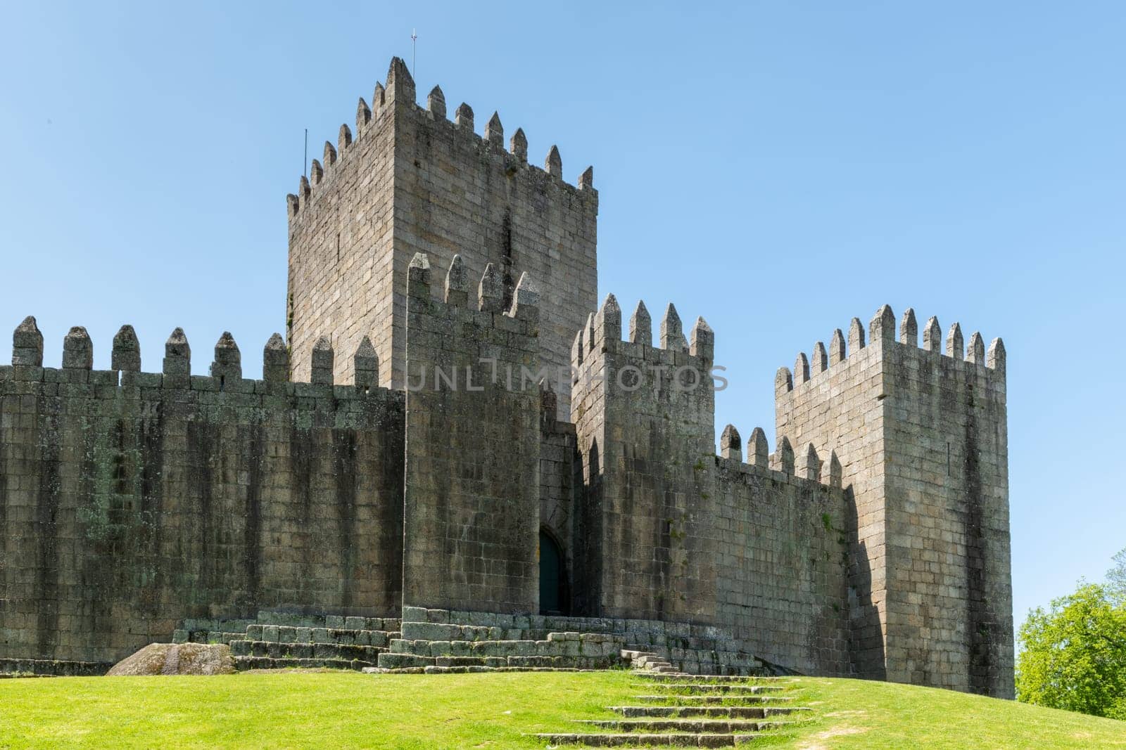 GUIMARAES, PORTUGAL - CIRCA APRIL 2018: The Castle of Guimaraes in the northern region of Portugal. It was built at the end of the 13th century following French influences.