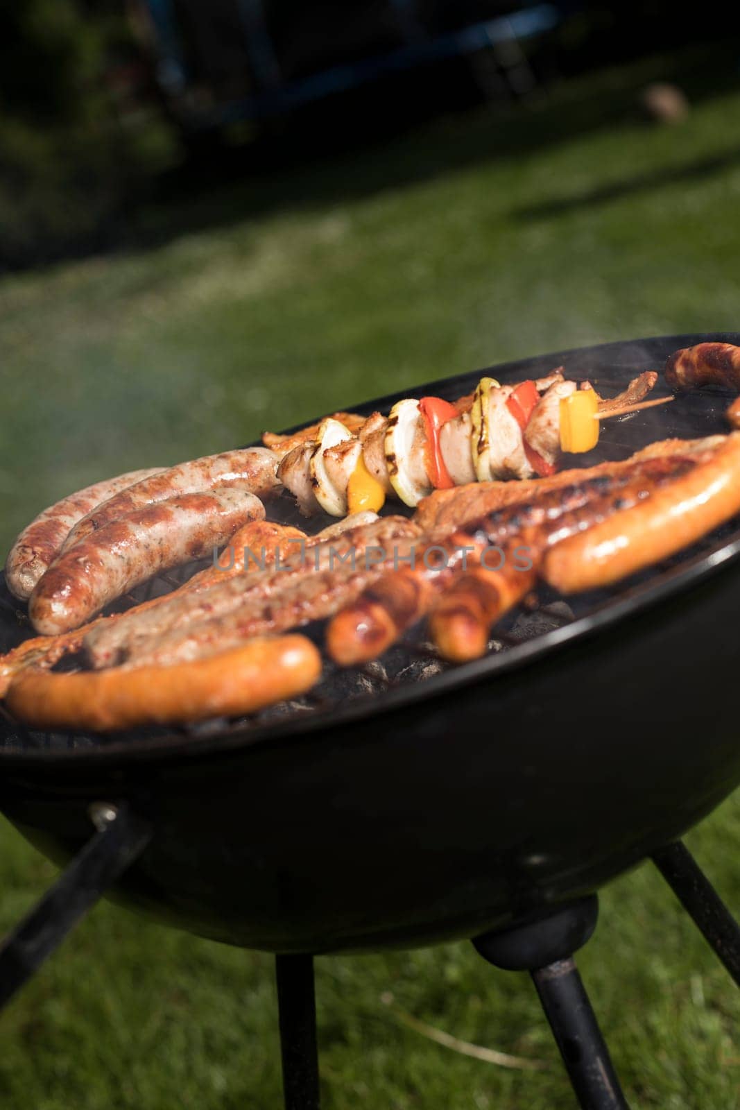 Grill with red hot briquettes, fire background