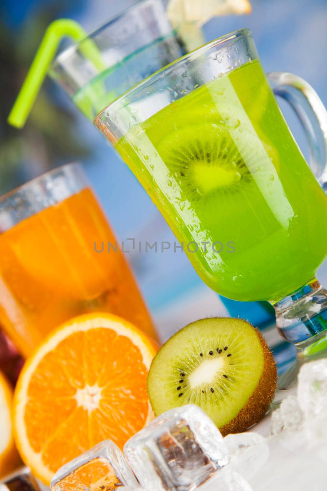 Summer drink with blur beach on background
