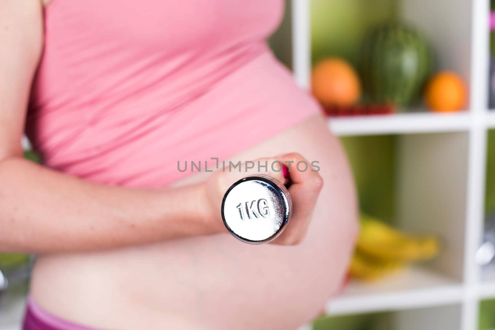 Pregnancy, sport, fitness, healthy lifestyle concept