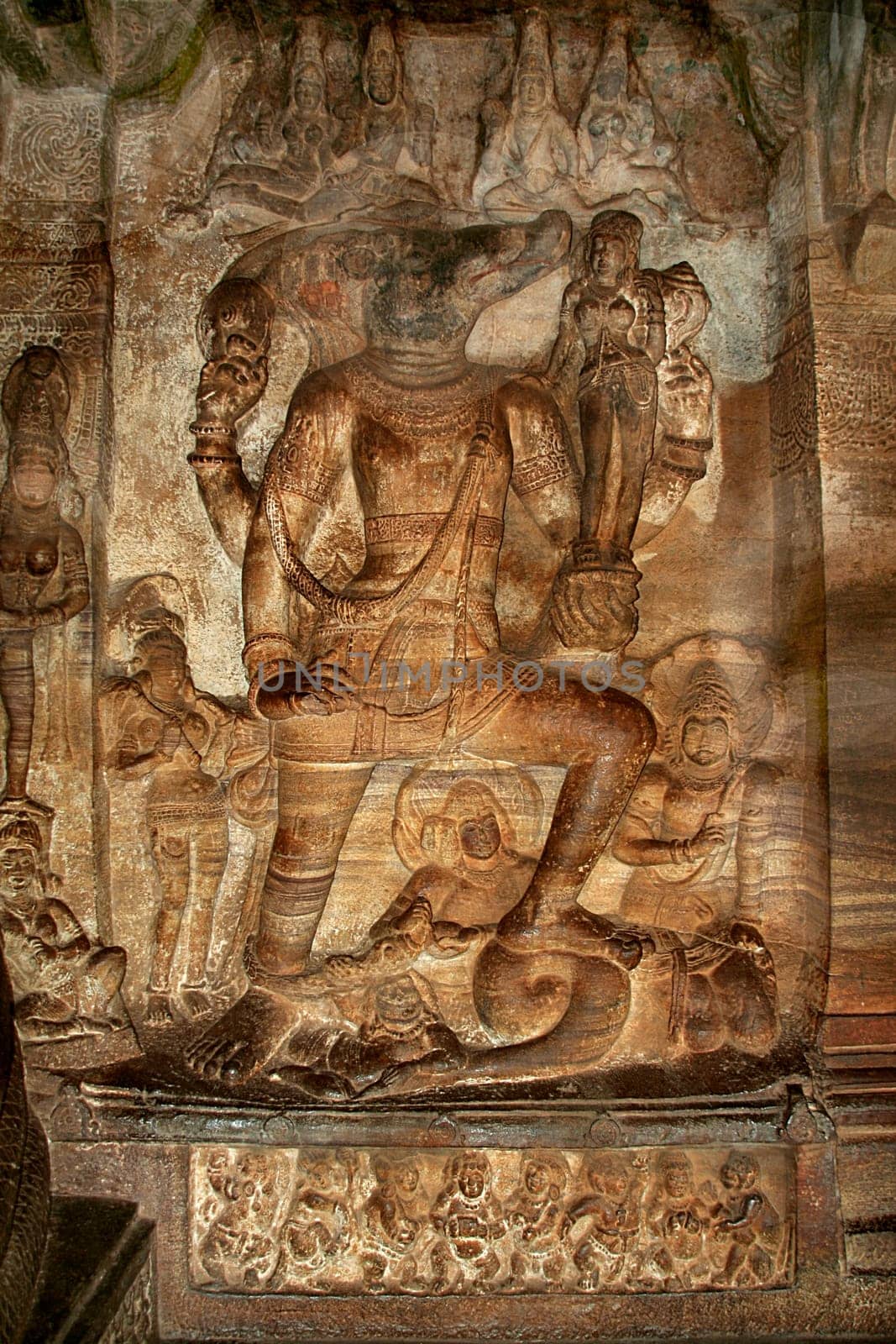 Bas relief wall sculpture depicting episode of Varaha lifting Bhudevi at Cave Temple in Badami, Karnataka, India, Asia