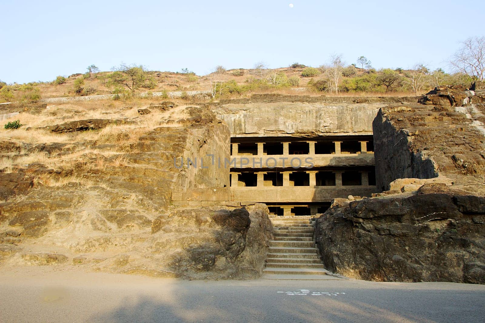View of storied cave temple on hill at Ellora in Maharashtra, India, Asia