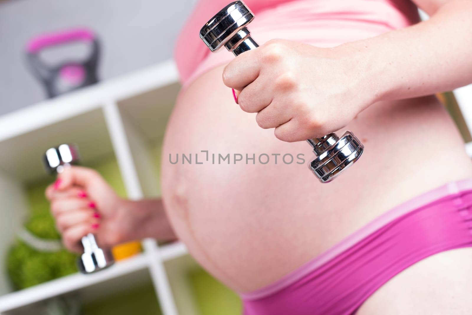 Pregnancy, sport, fitness, healthy lifestyle concept