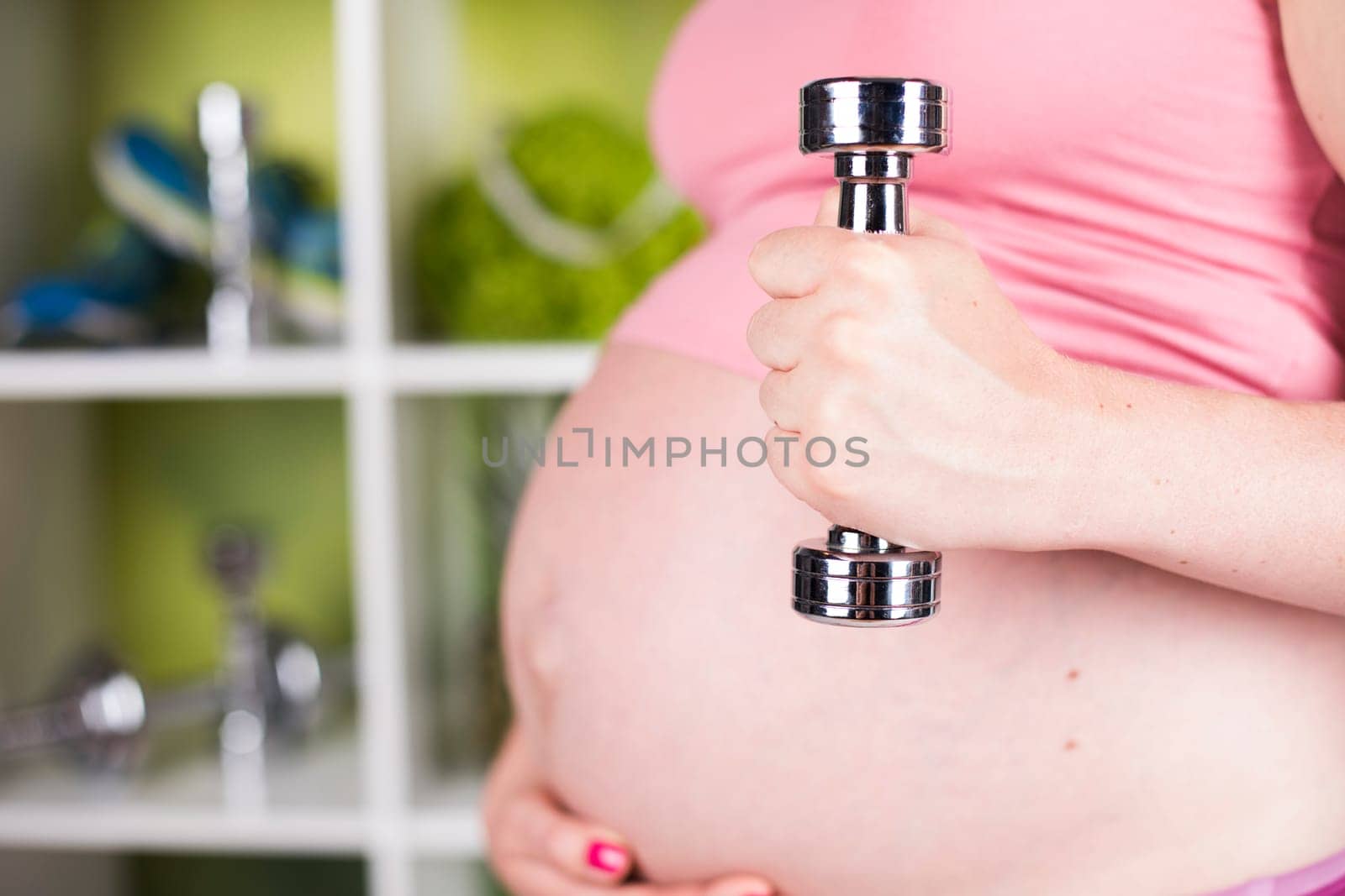 Pregnancy, sport, fitness, healthy lifestyle concept