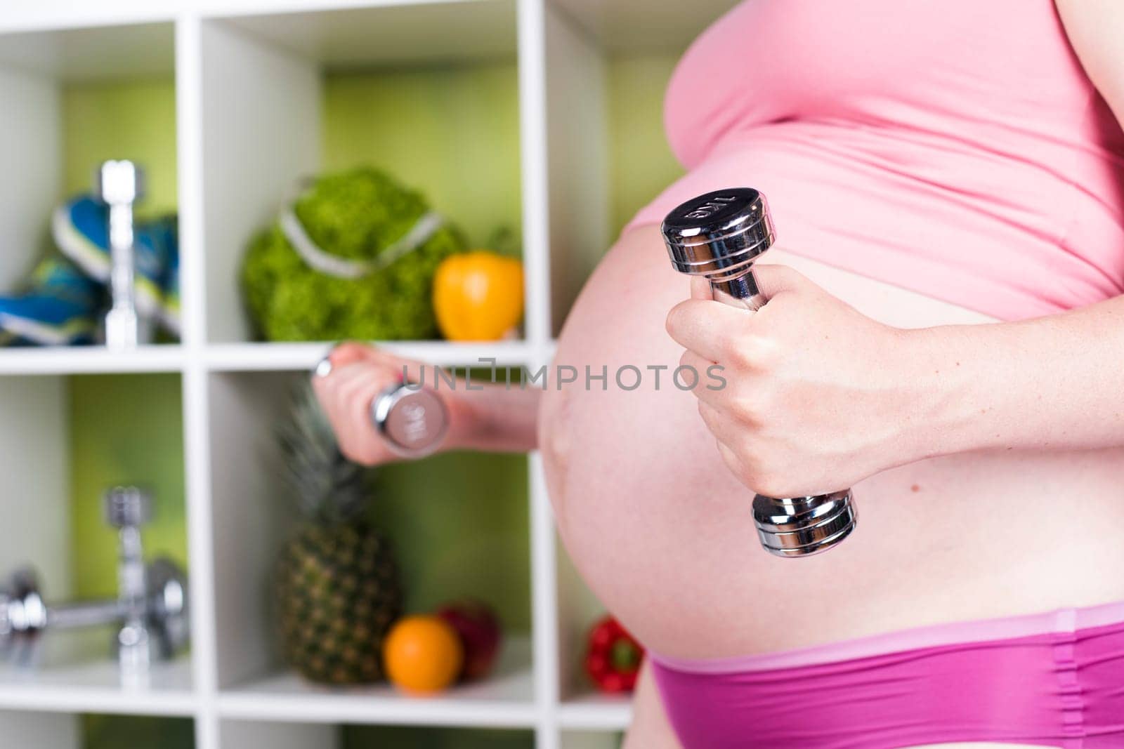 Pregnancy, sport, fitness, healthy lifestyle concept