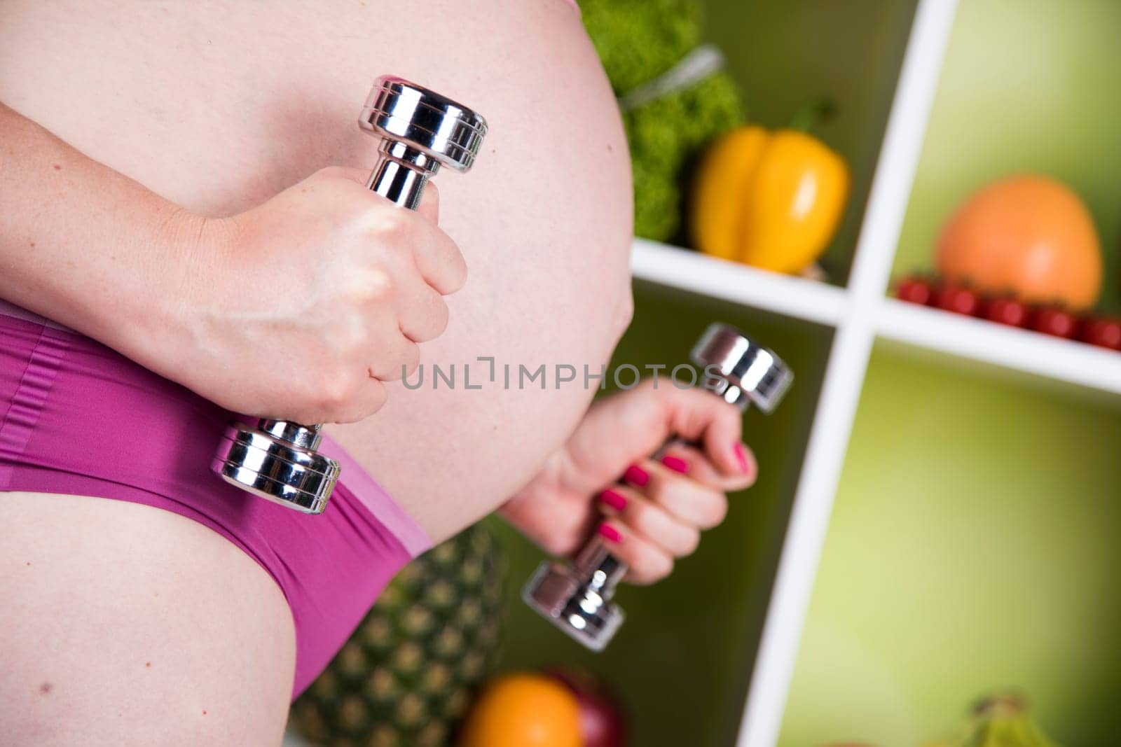 Pregnancy, sport, fitness, healthy lifestyle concept