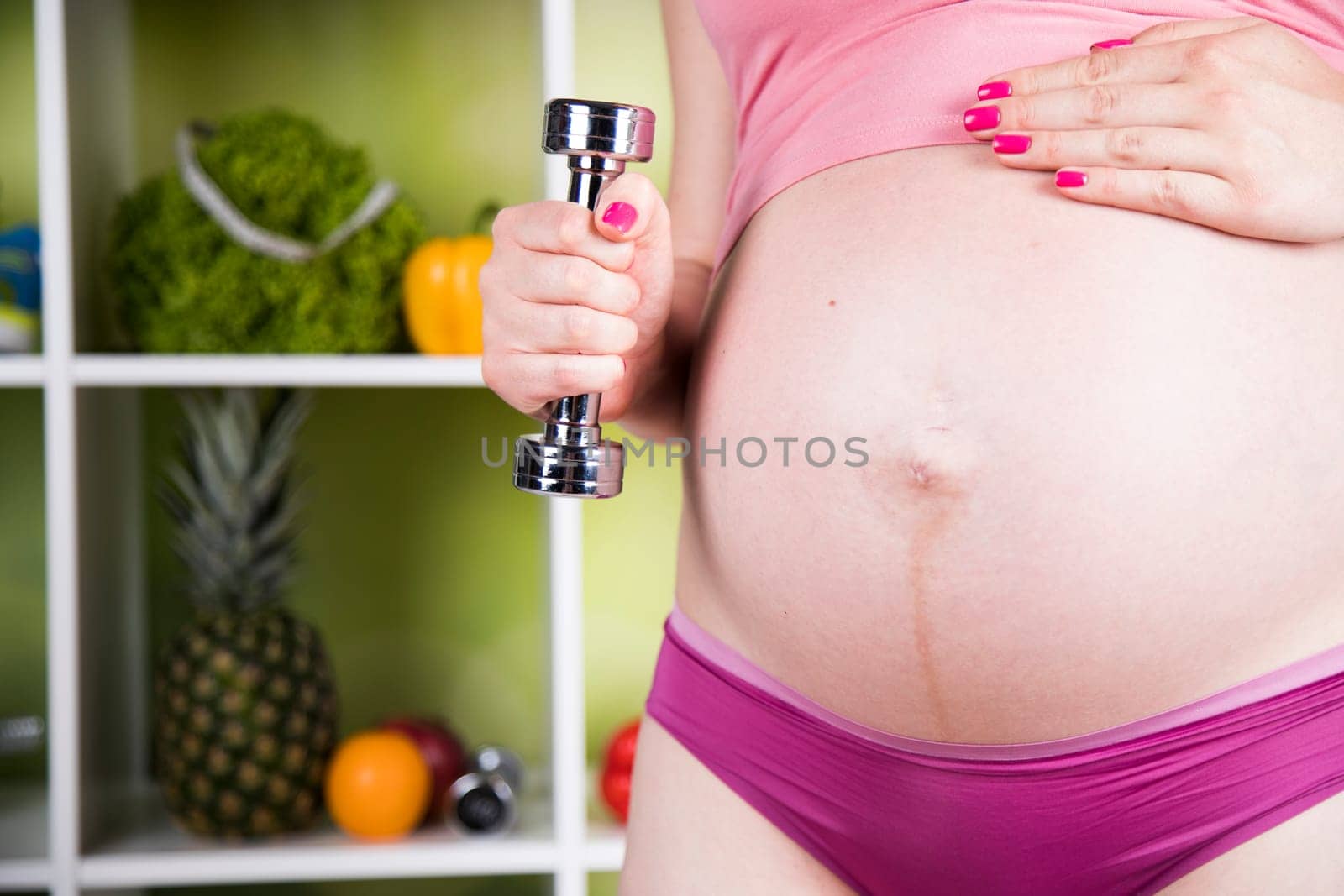 Pregnancy, sport, fitness, healthy lifestyle concept