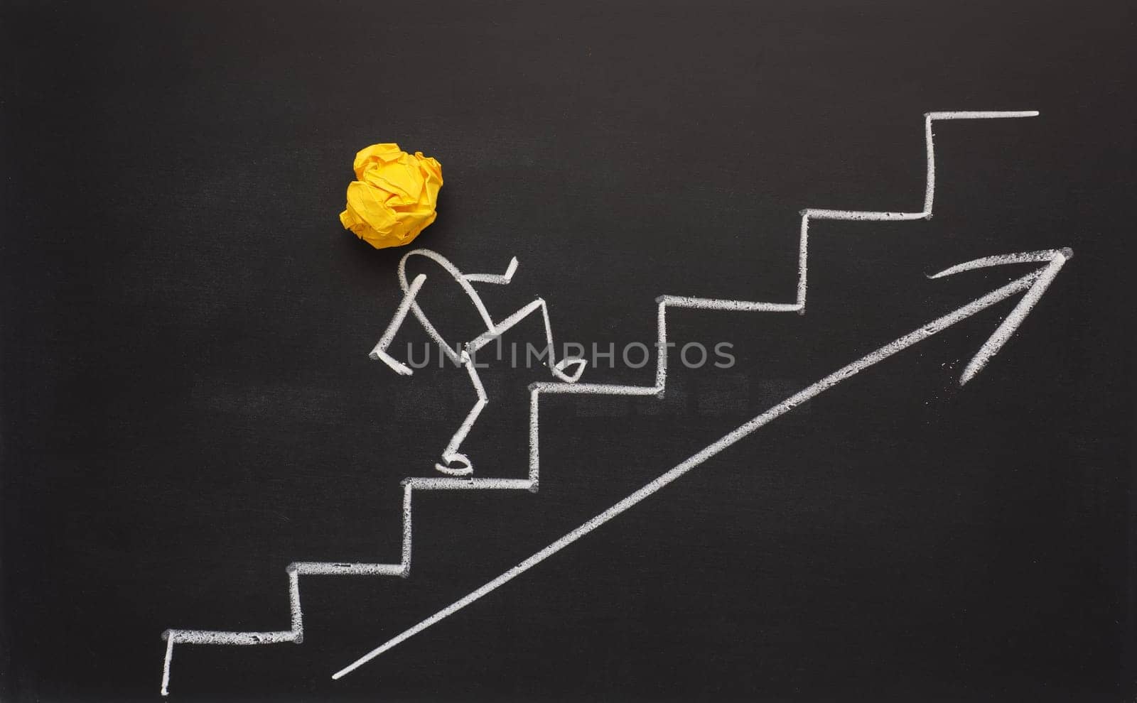 Success or great idea concept on a chalkboard with crumpled paper