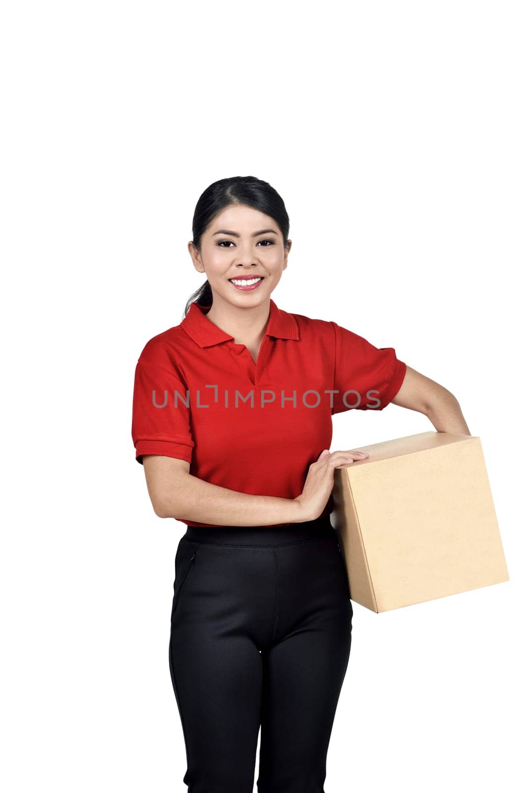 Beautiful asian delivery woman holding cardboard box isolated over white background