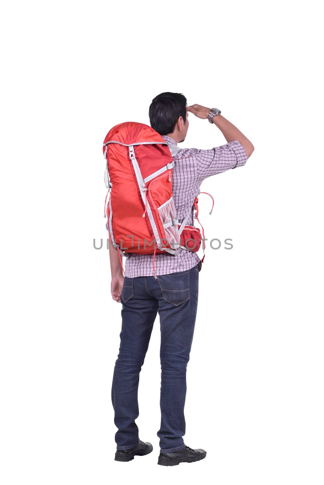 Rear view of asian backpacker man looking at view posing isolated over white background