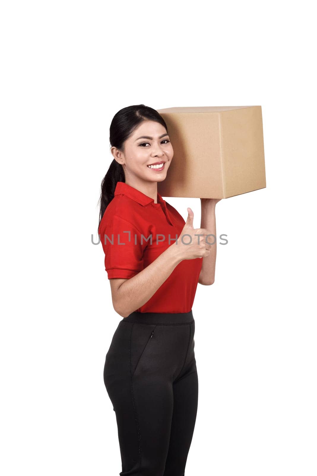 Professional asian delivery woman bring the cardboard box standing isolated over white background