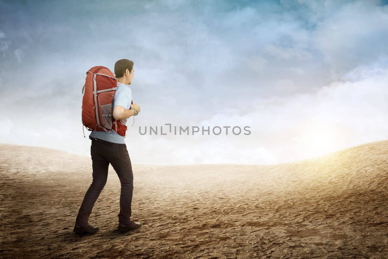 Attractive asian traveler hiking on the mountains
