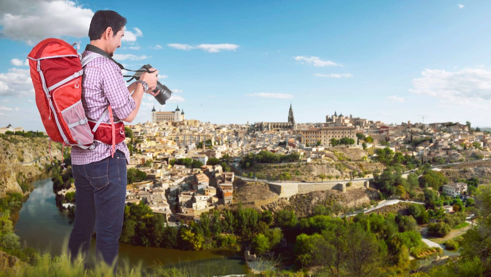 Young asian traveler want to taking a photos on the city