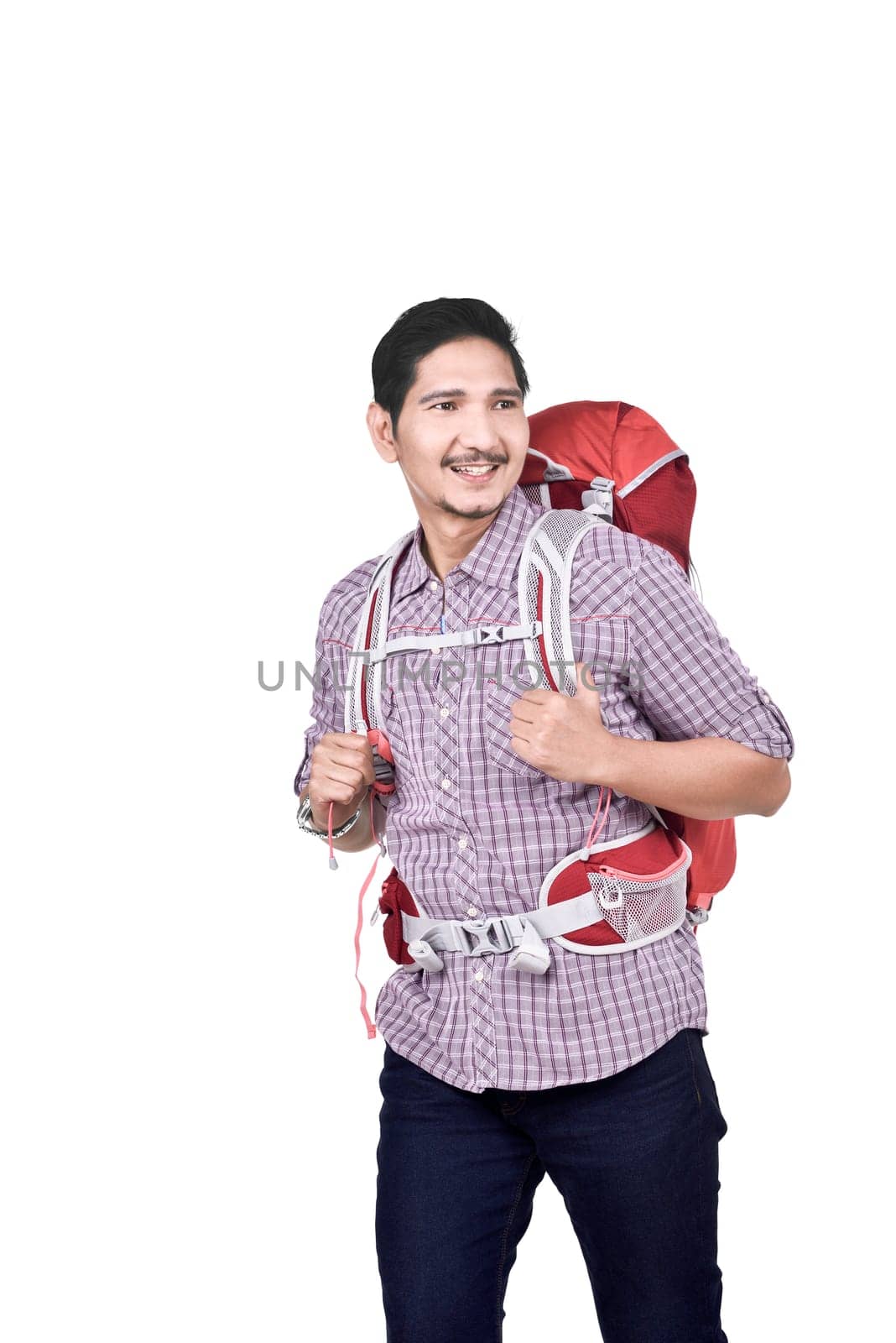 Portrait of asian male backpacker ready to traveling standing isolated over white background