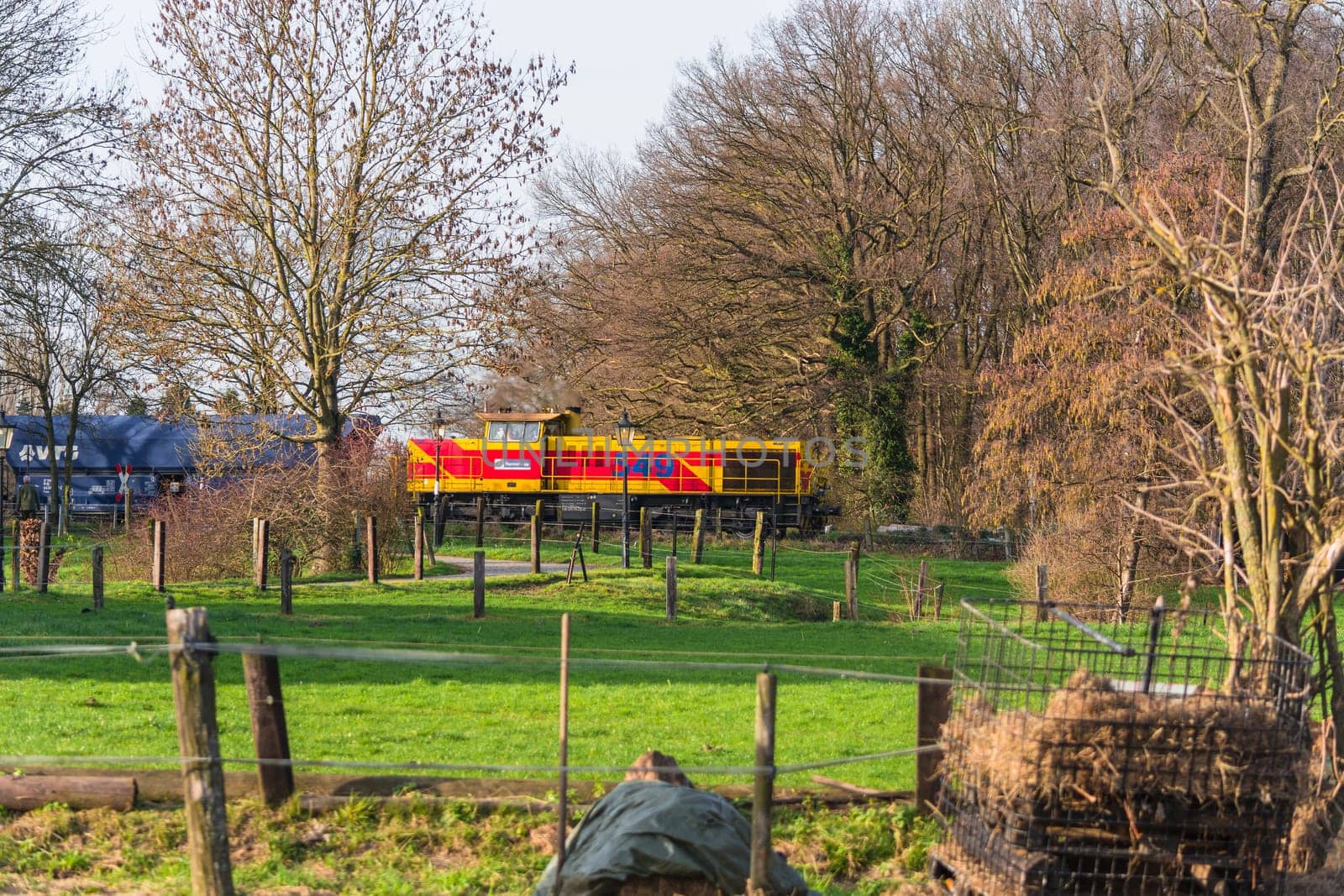 Ratingen, Nrw, Germany - December 28, 2015:.Locomotive at the railroad crossing in Ratingen at the moated castle "house to house"". By propelled fast train towards Muelheim - food."
