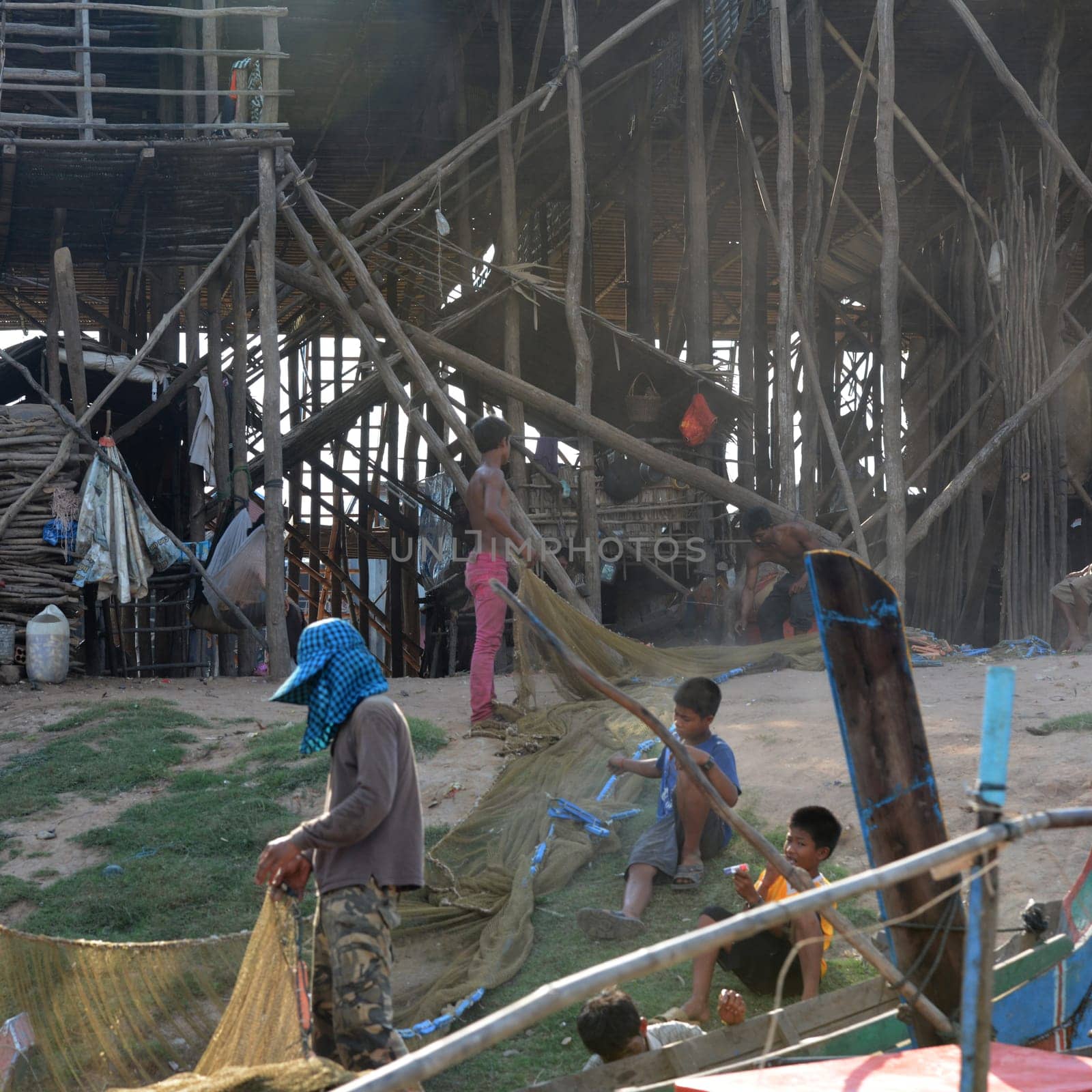 people at the daily life at the Lake Village Kompong Pluk at the Lake Tonle Sap near the City of Siem Riep in the west of Cambodia.   Cambodia, Siem Reap, April 2014
