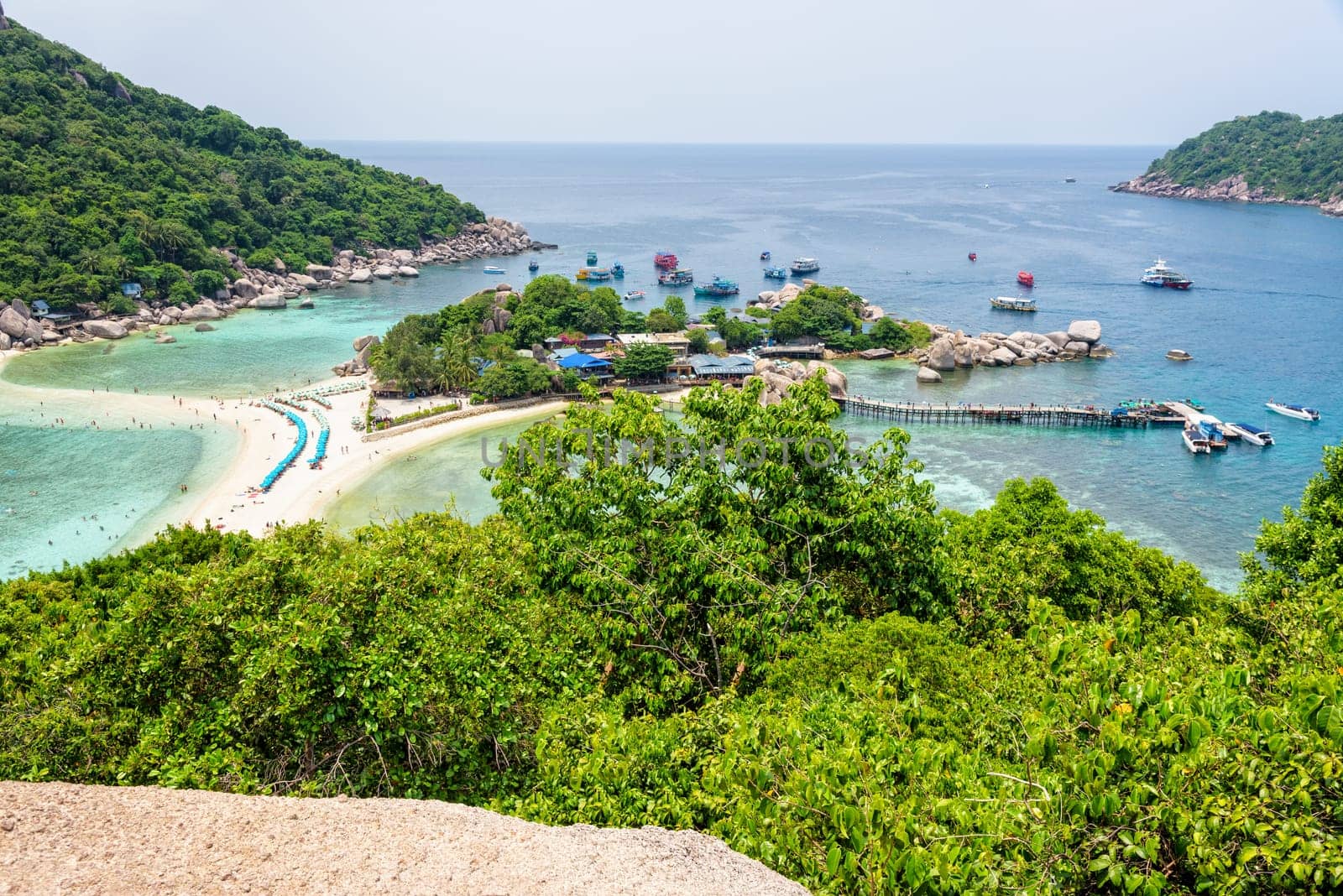 High angle view beautiful nature landscape sea beach and pier for boat trip at Koh Nang Yuan Island during summer is a famous tourist attraction in the Gulf of Thailand, Surat Thani, Thailand