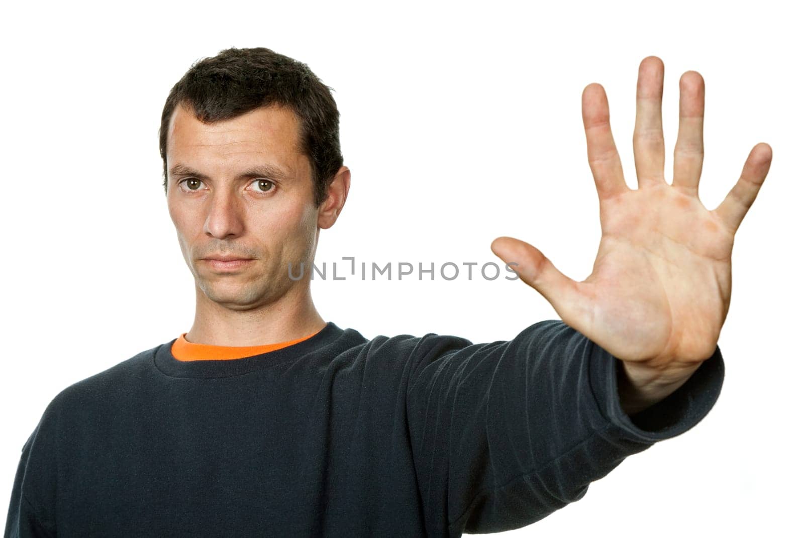 young man making stop with his hand