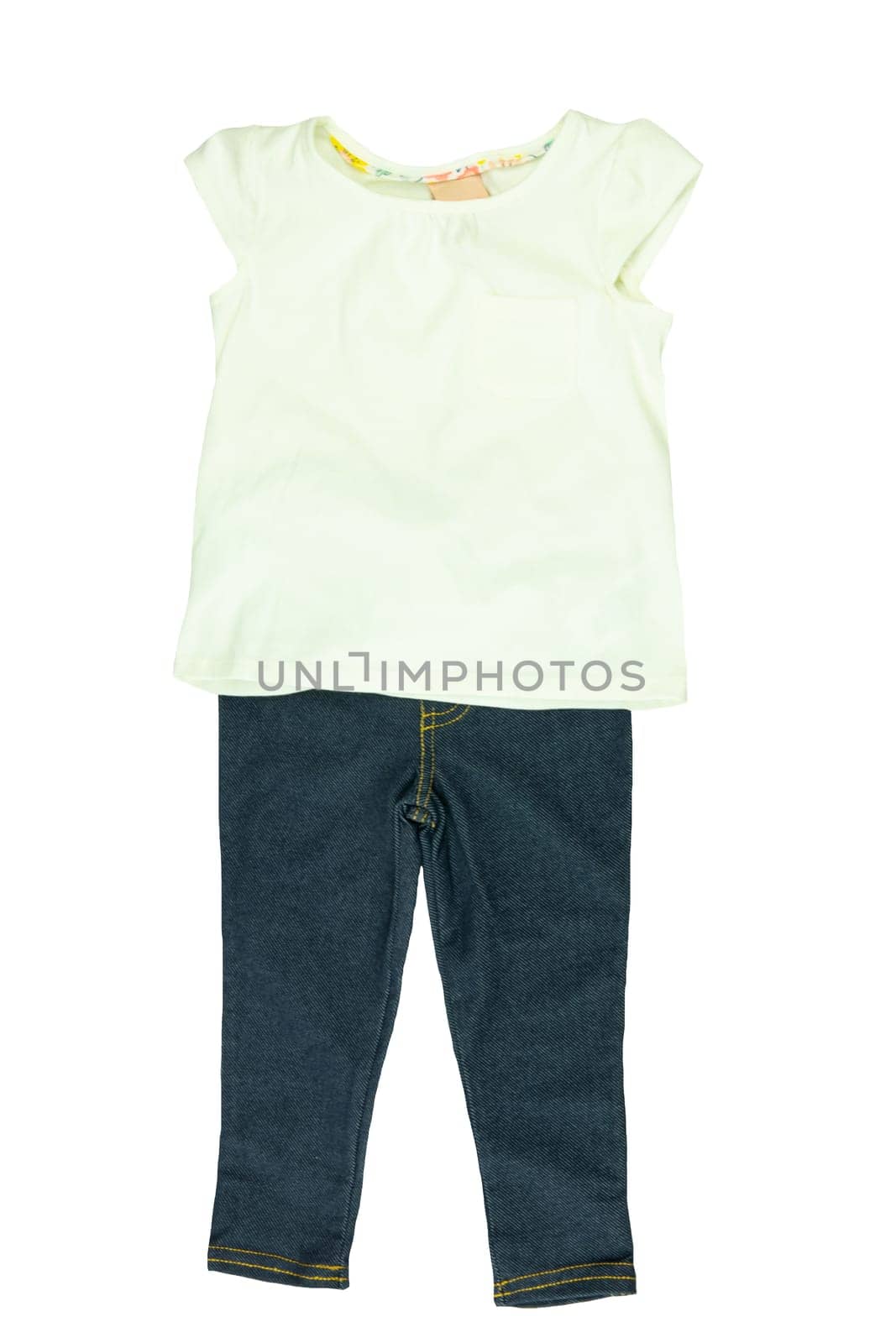 Childrens white shirt  and a dark blue jeans trousers isolated on white background. Fashion children.