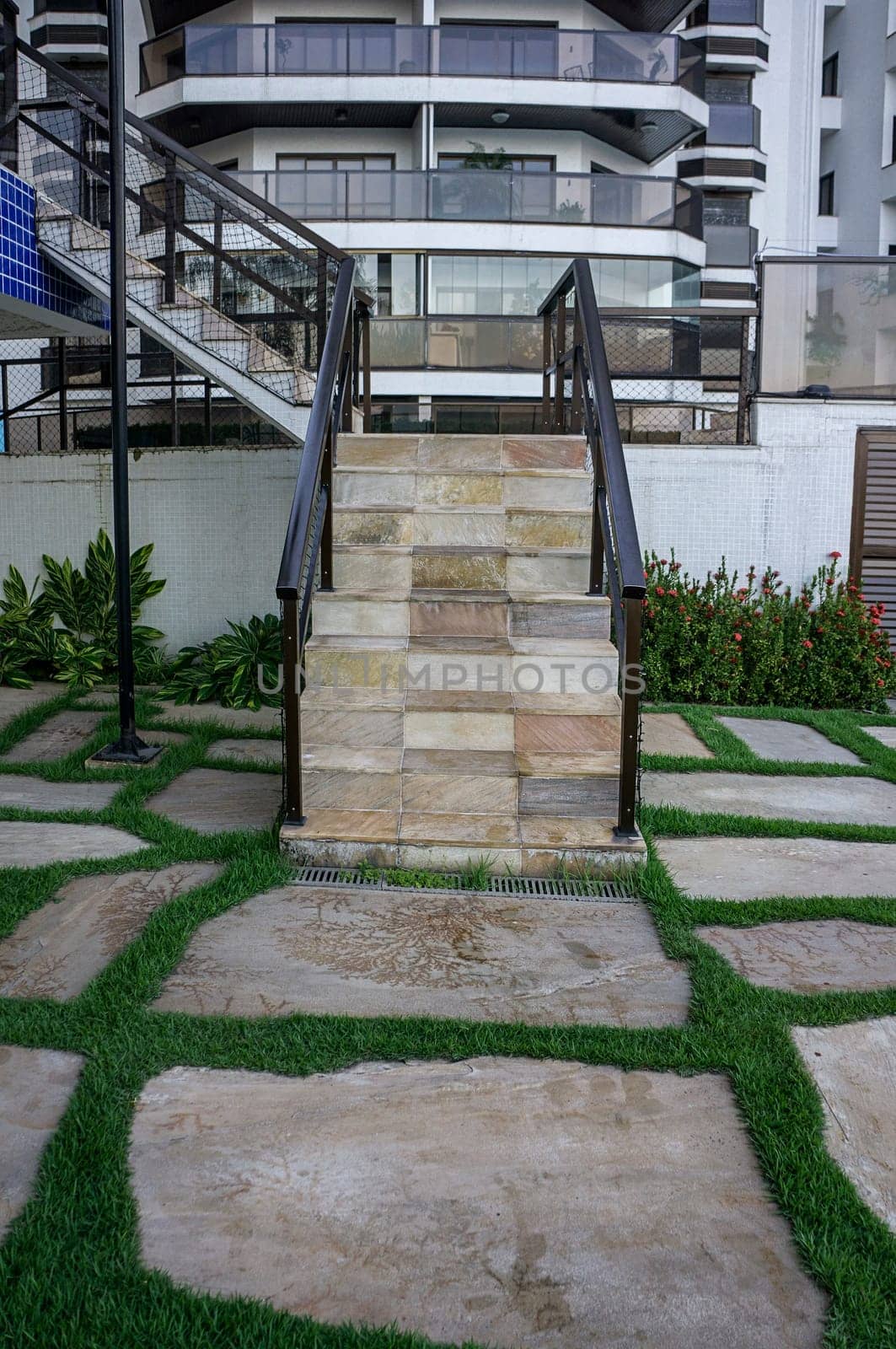 stone grass floor outdoors paving staircase mosaic white wall