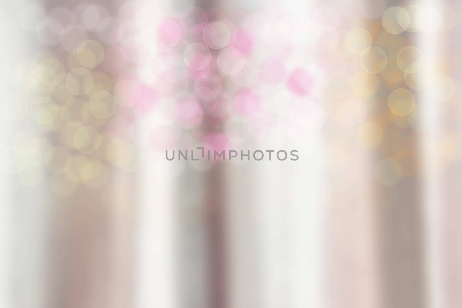 Blurred curtain with colorful bokeh as abstract background.