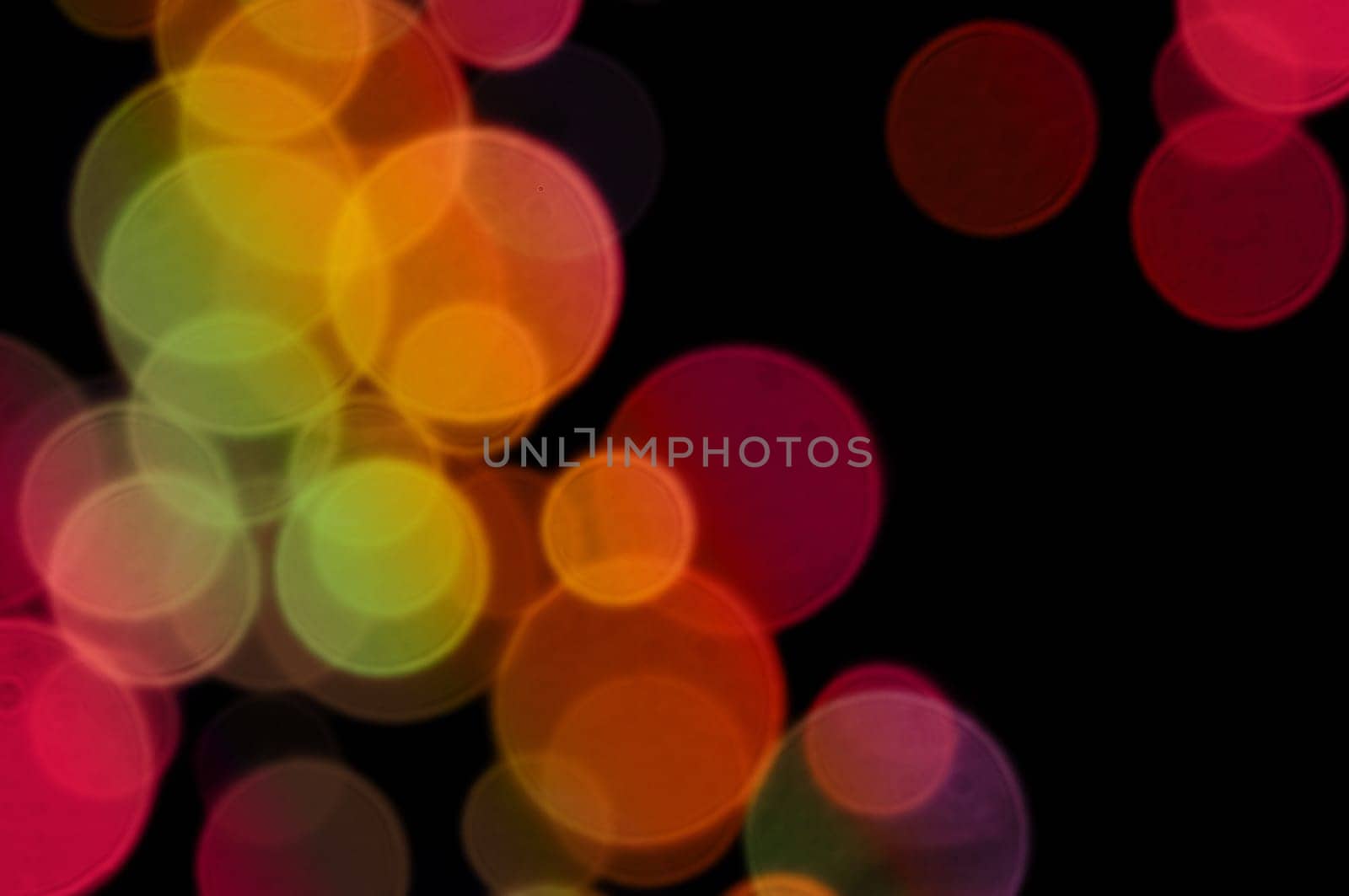Abstract blurry lights pattern. Colorful transparent circles background.
