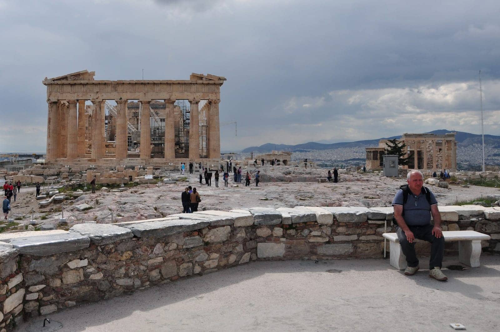 ATHENS, GREECE - MAY 6, 2014: View of Parthenon and visitors at the Acropolis of Athens, Greece.