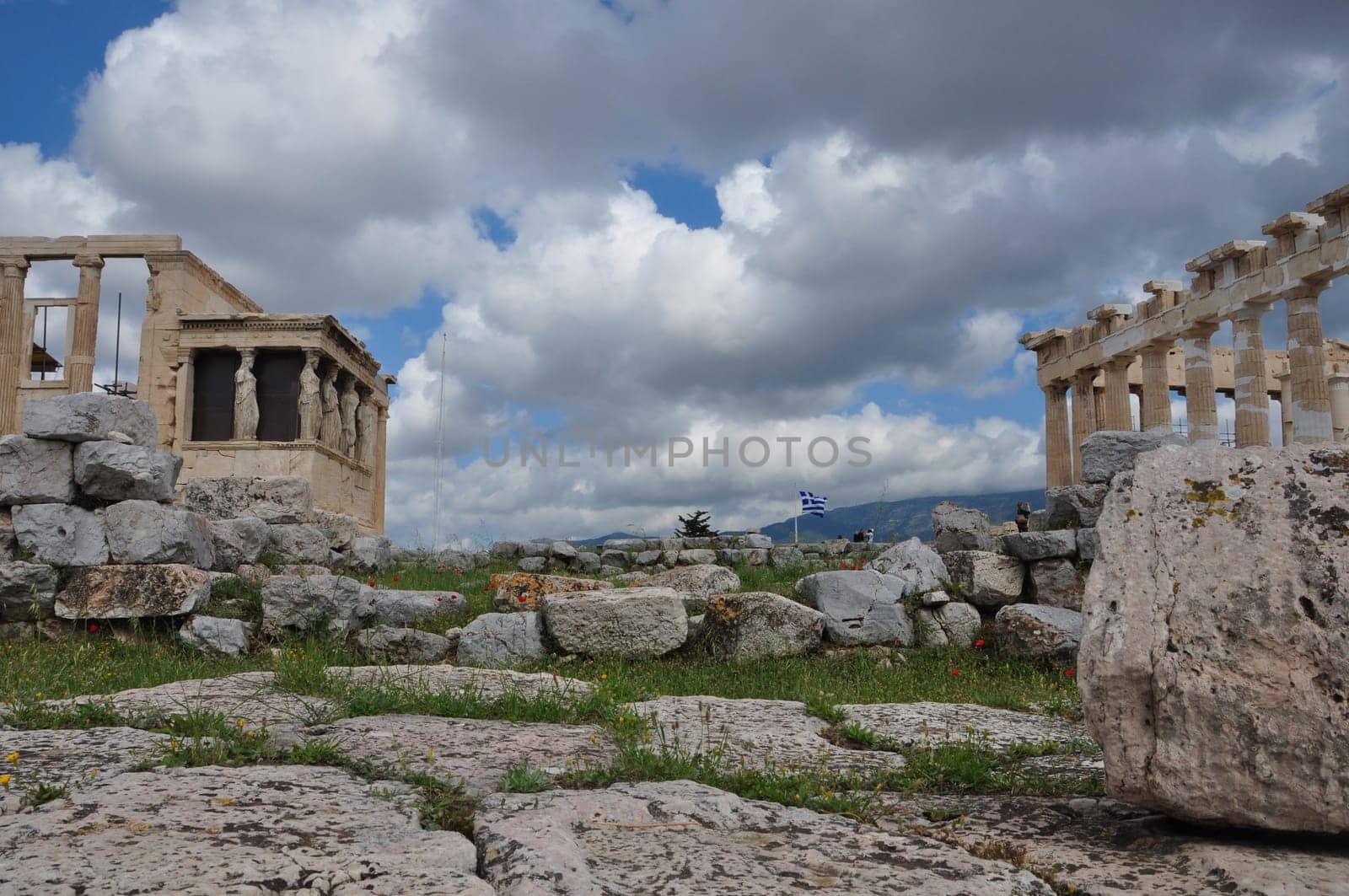 ATHENS, GREECE - MAY 6, 2014: View of Parthenon and Erechtheion with the Porch of Caryatids at the Acropolis of Athens, Greece.