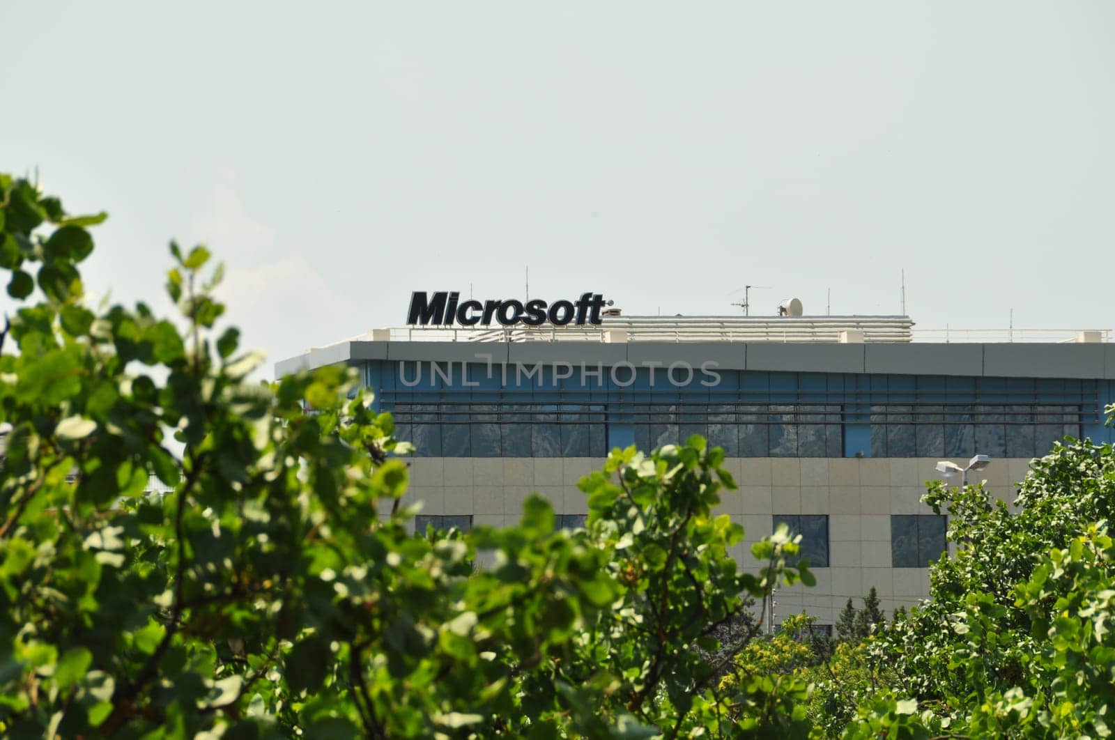 ATHENS, GREECE - JUNE 16, 2014: Microsoft corporation office building facade with logo in Athens, Greece.