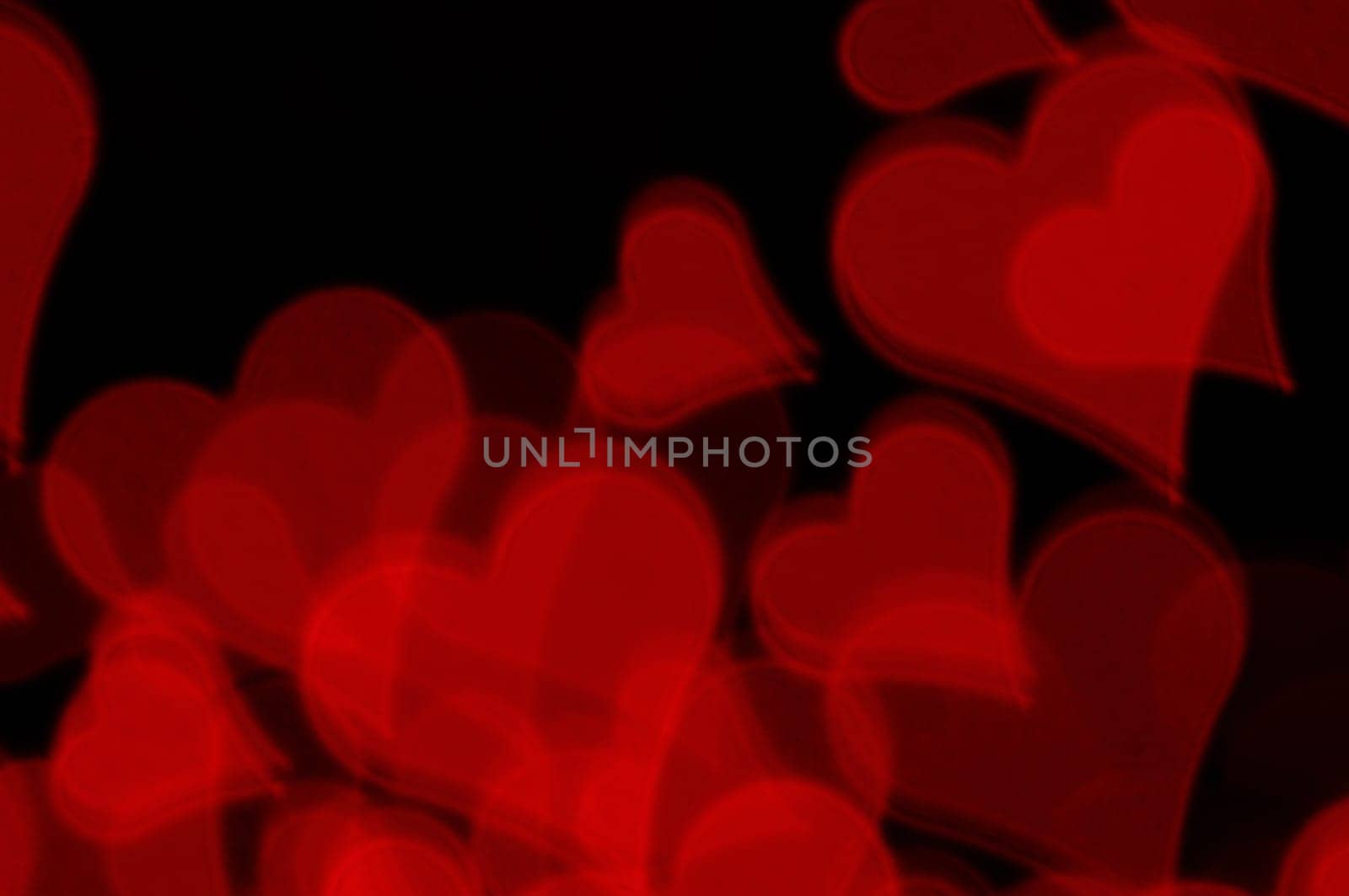 Red hearts blur pattern. Abstract love and romance background.