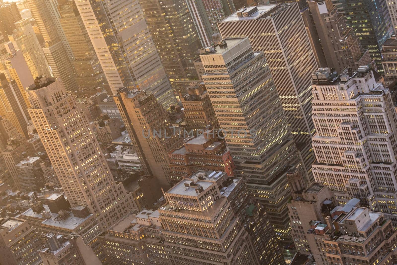 Aerial view of New York City skyline with Manhattan midtown urban skyscrapers at dramatic after the storm sunset, USA.