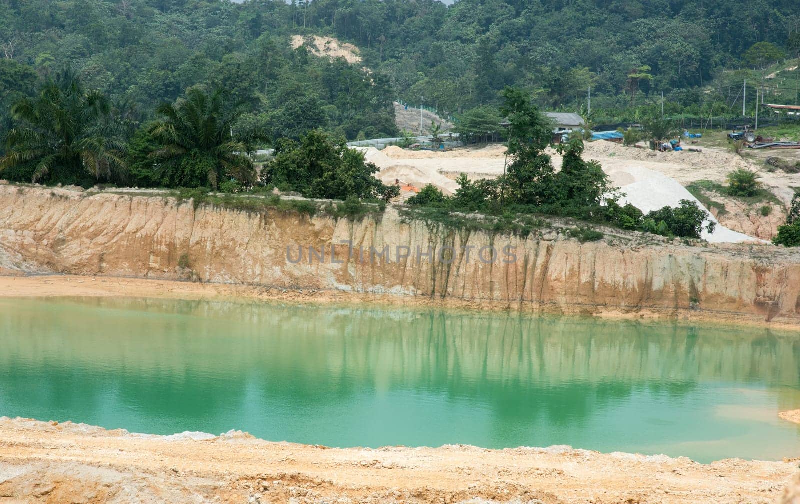 Tailing ponds and sand quarry in south east Asia.