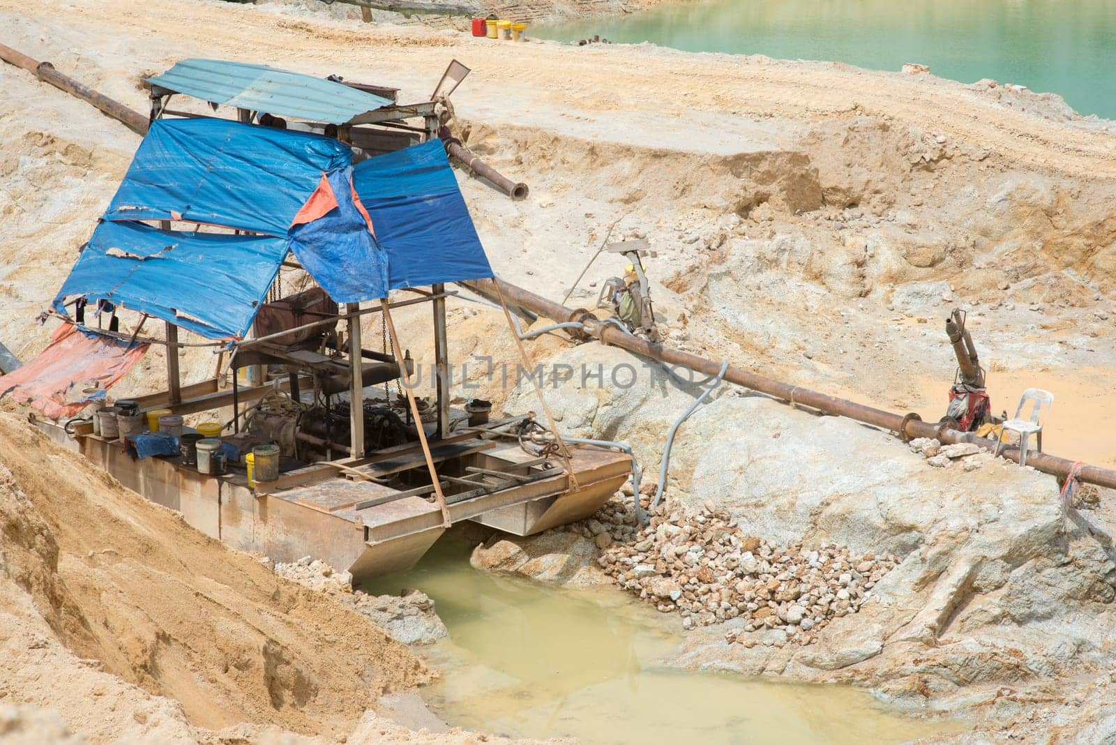 Dredge ship on the water. Sand quarry in Malaysia.