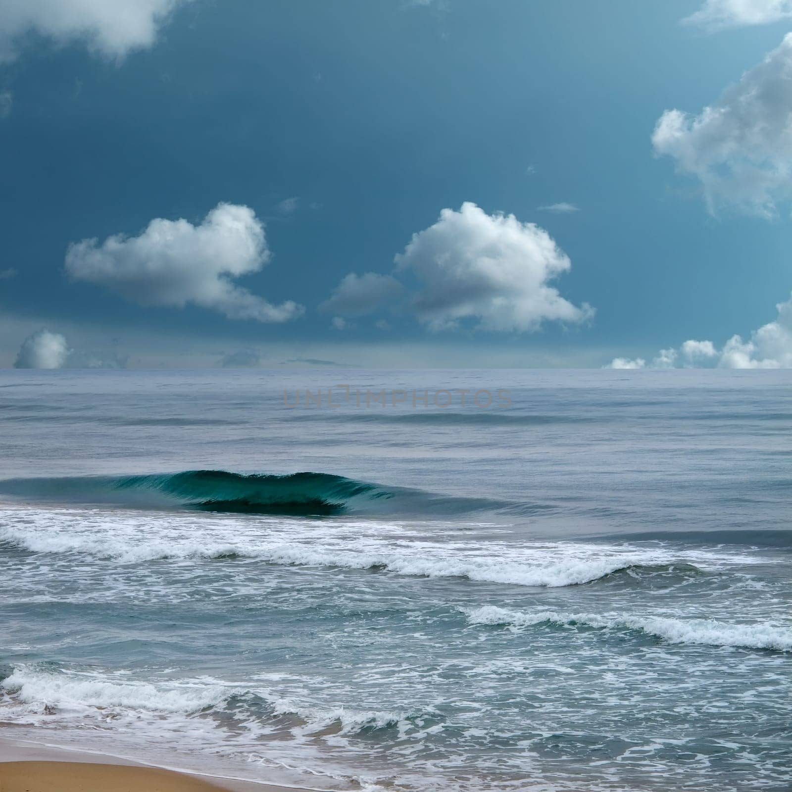 seascape image of waves on sea over stormy sky