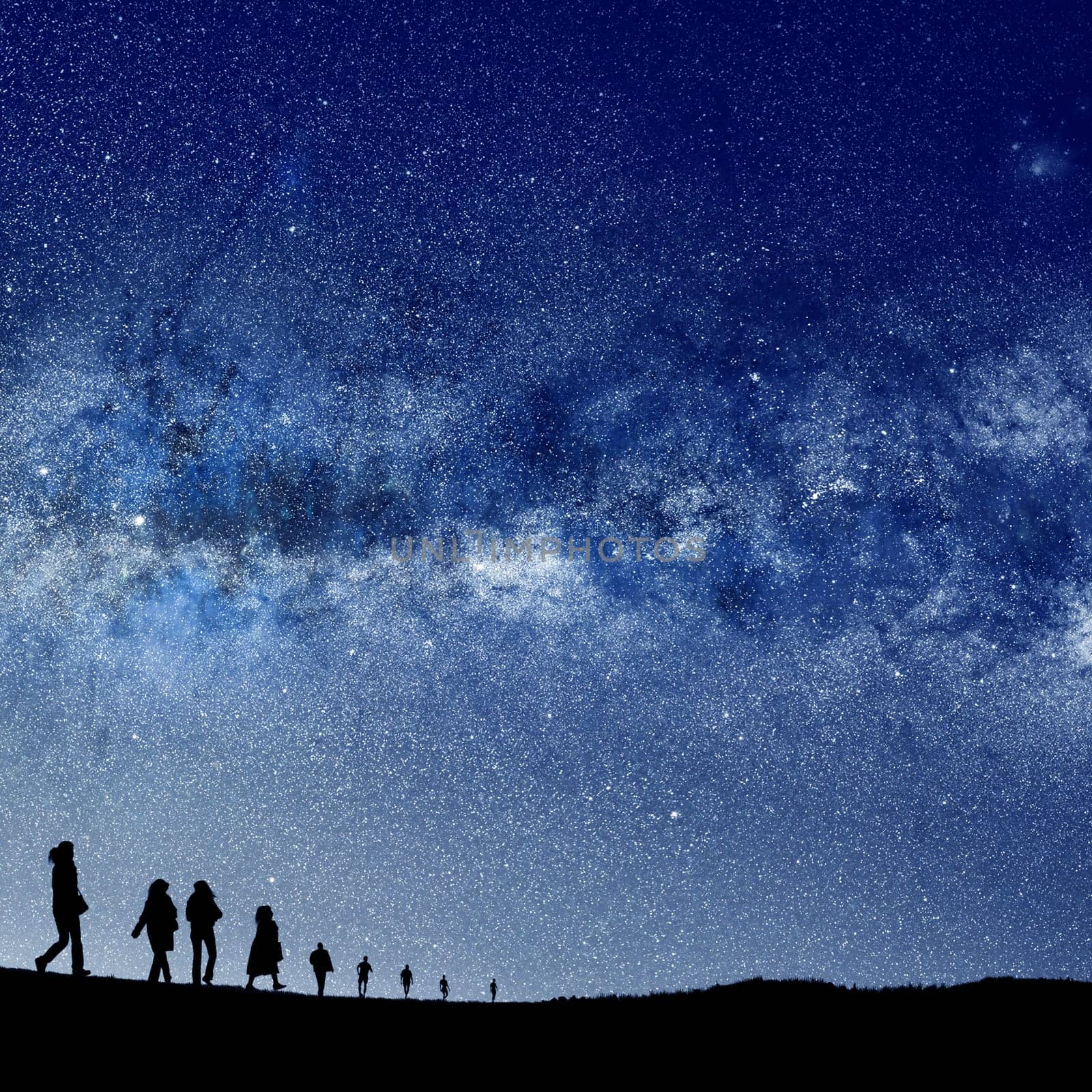 conceptual image of silhouetted people and abstract universe lights. NASA galaxy images manipulated and used https://nasasearch.nasa.gov/search/images?utf8=%E2%9C%93&affiliate=nasa&query=galaxy+images
