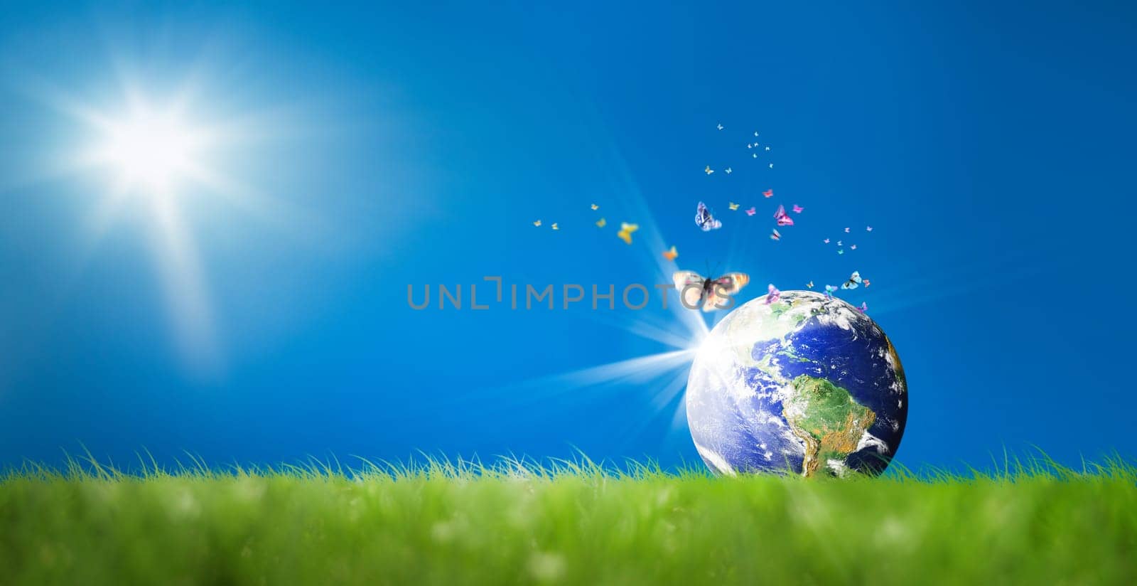 conceptual image of world on green landscape. NASA world map image layered and used www.nasa.gov , https://www.flickr.com/photos/gsfc/sets/72157632172101342