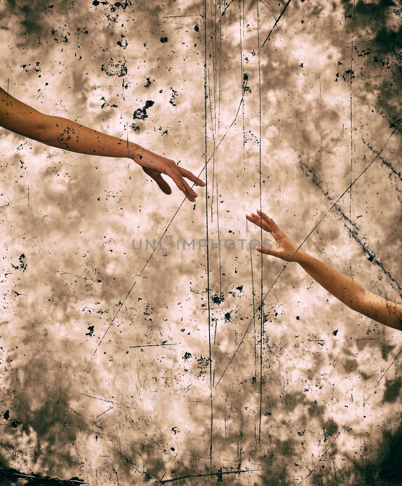 An image of hands reaching each other.