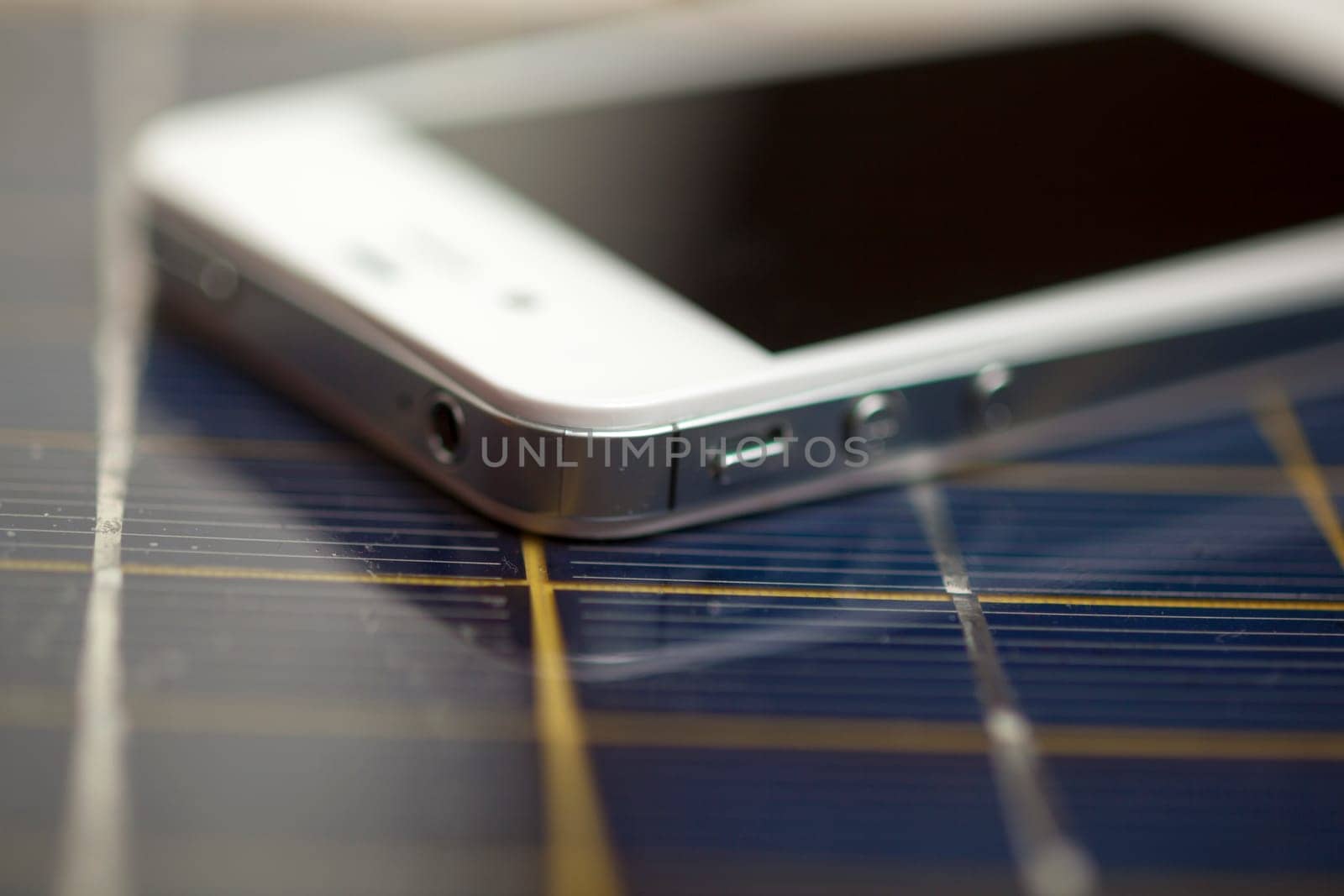Green energy concept - Mobile Phone charging with solar power