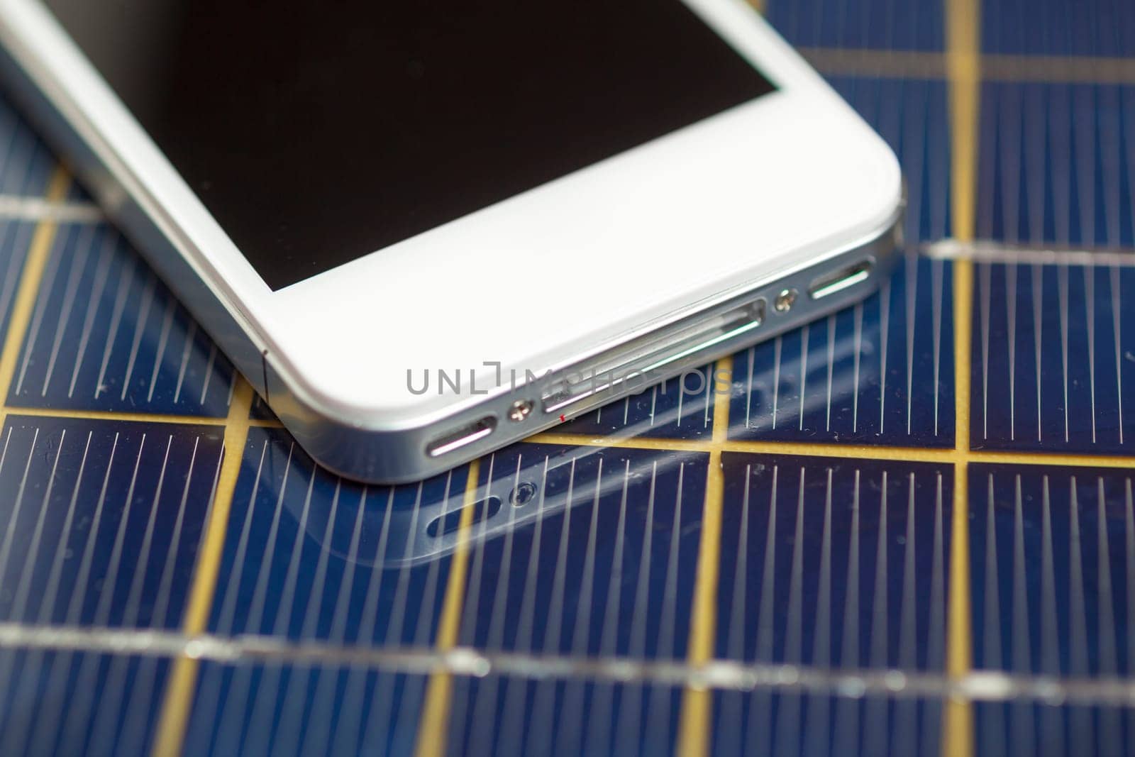 Green energy concept - Mobile Phone charging with solar power